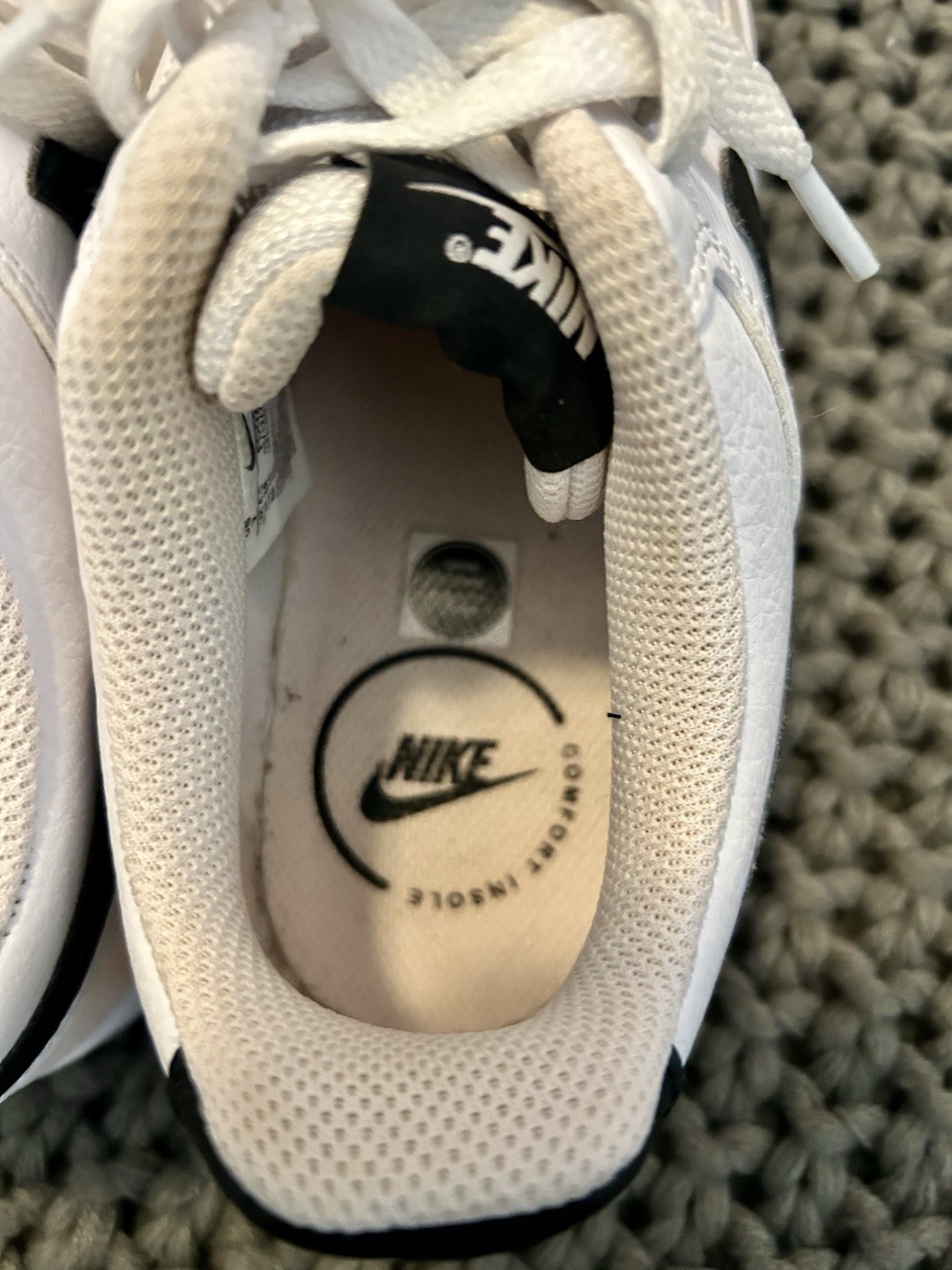 Nike Woman’s Court Vision Size 7 White with Black Swoosh Pink accents