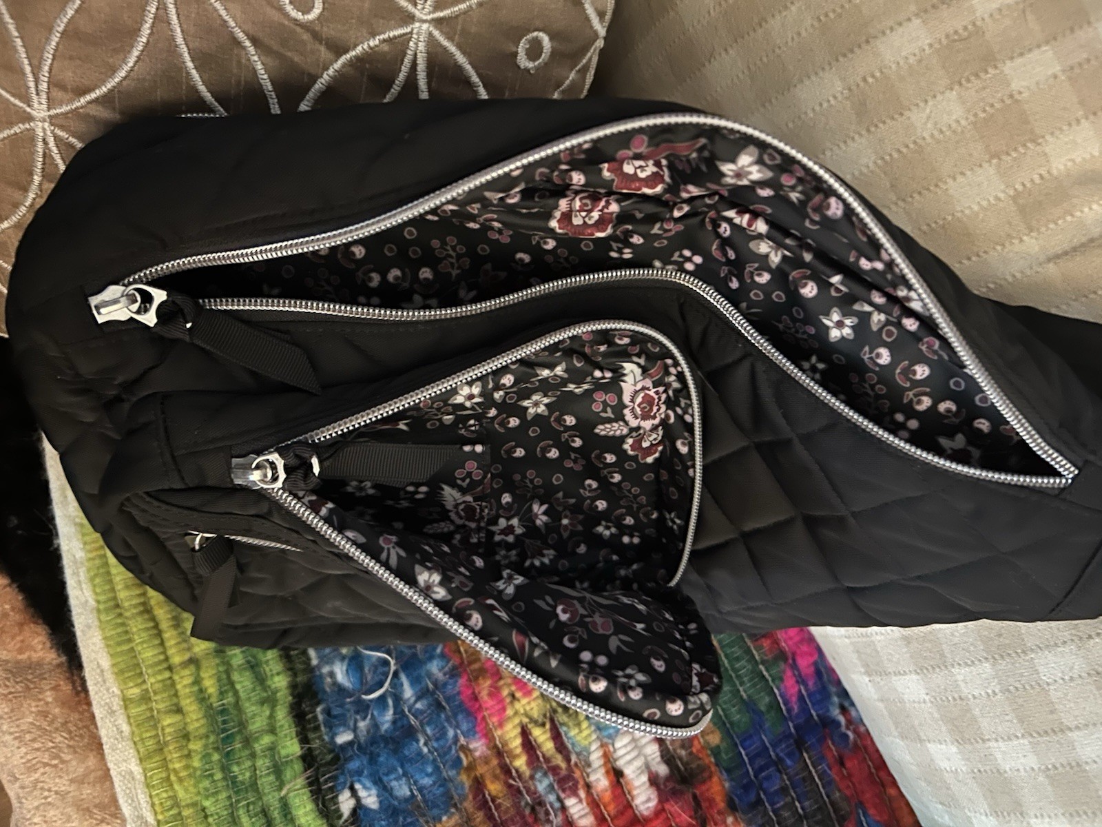 Black Sling Crossbody Bag Floral Lining Multi-Zip Pockets Adjustable Strap