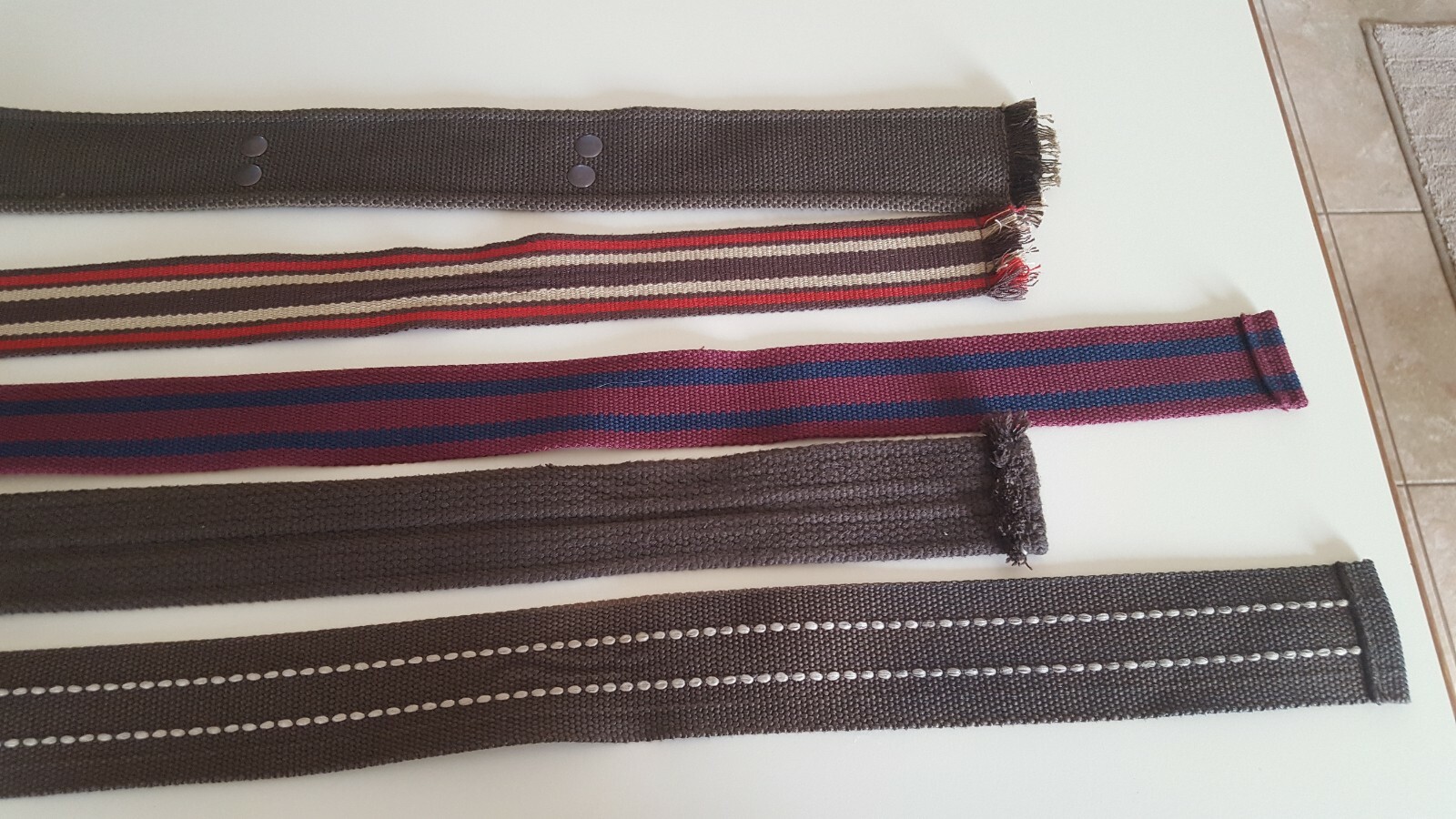 LOT OF 5 MENS BELTS, 3 BROWN AND TWO MULTI COLOR FITS WAIST UP TO 39 INCHES