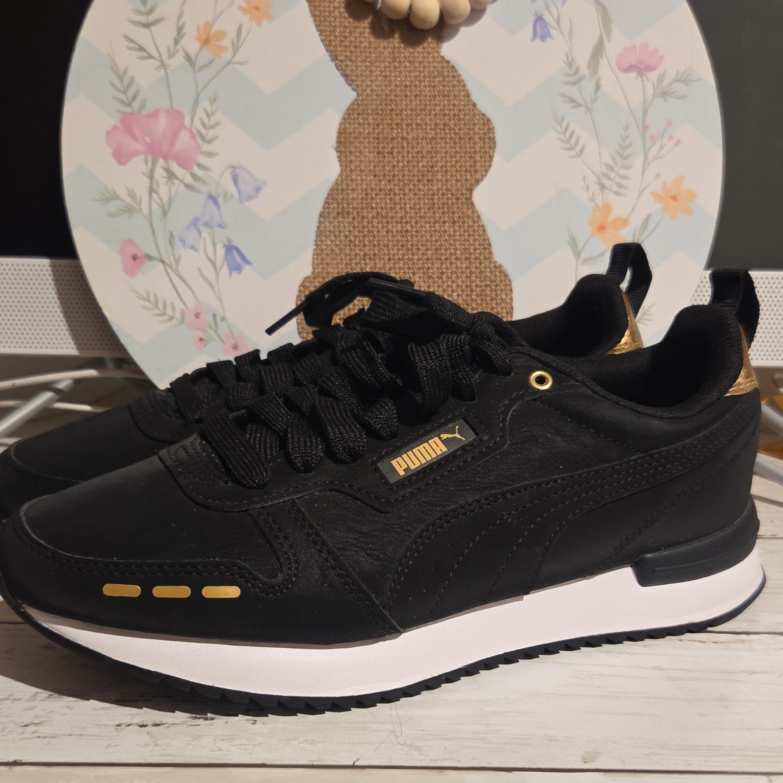 PUMA Black/Gold/White Lace-Up Low Top Sneaker Synthetic Upper Rubber Sole. Women