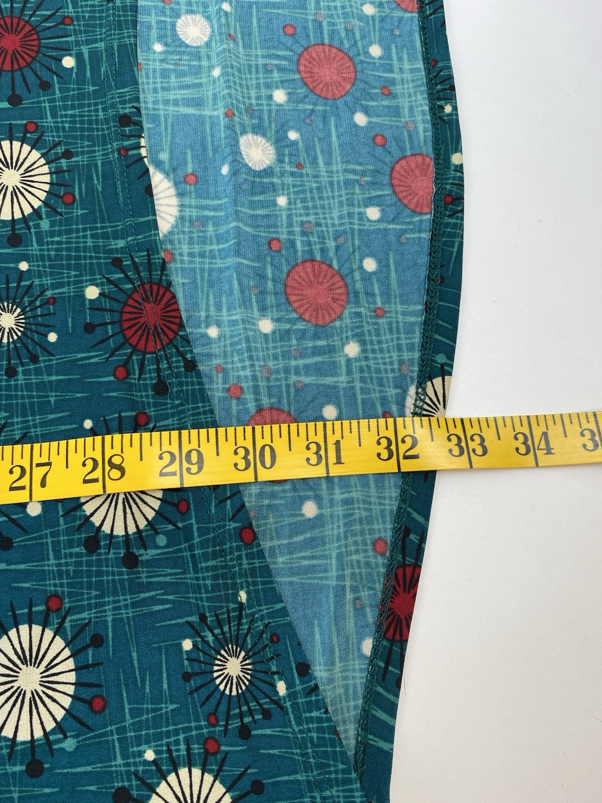 LulaRoe women’s stretch short sleeve green top hi-low measures 3X (see pictures)