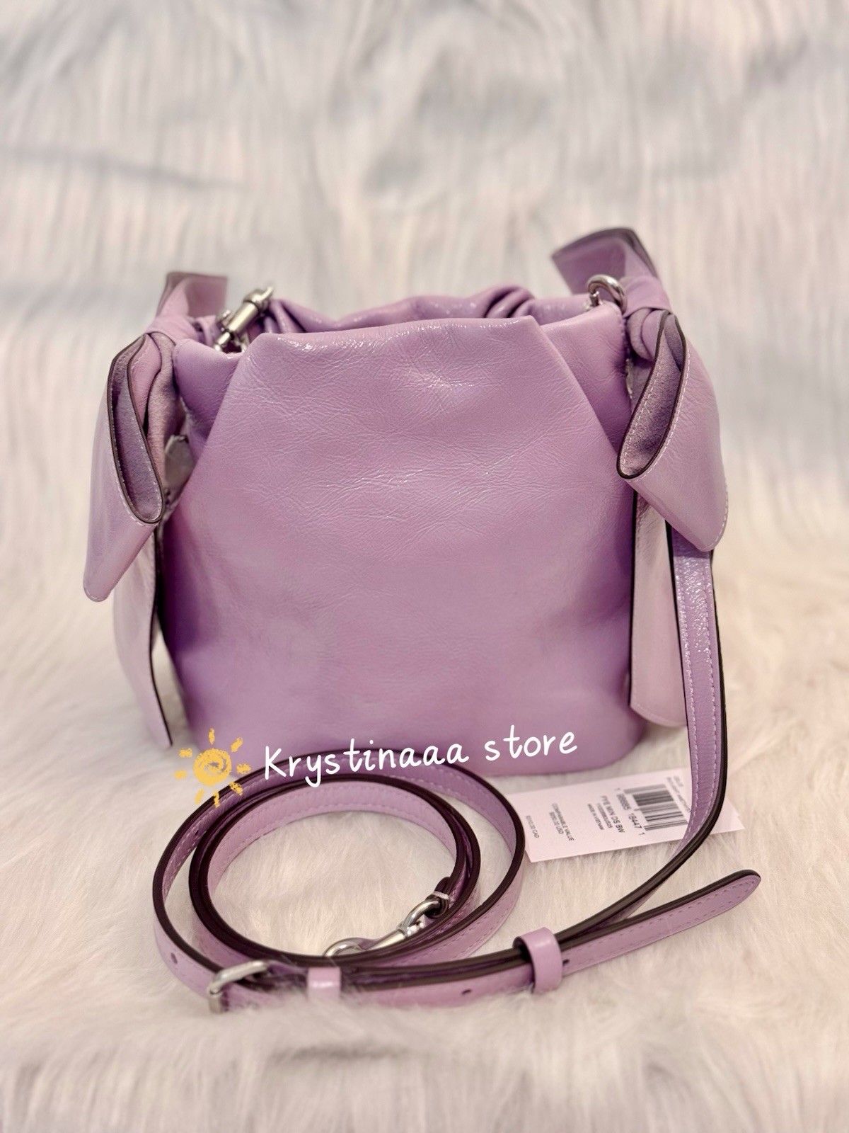 NWT Coach Faye Mini Drawstring Bag With Bows CEL03 in Light Amethyst Leather
