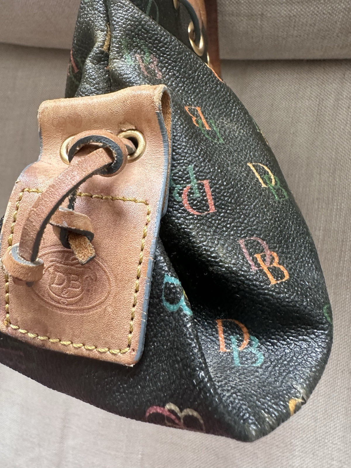 Dooney & Bourke Black/Multicolor Logo Medium Tote Double Handle Tassel Charm