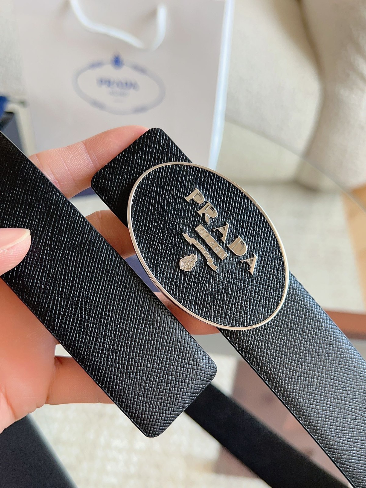 Prada men’s black-button black leather belt