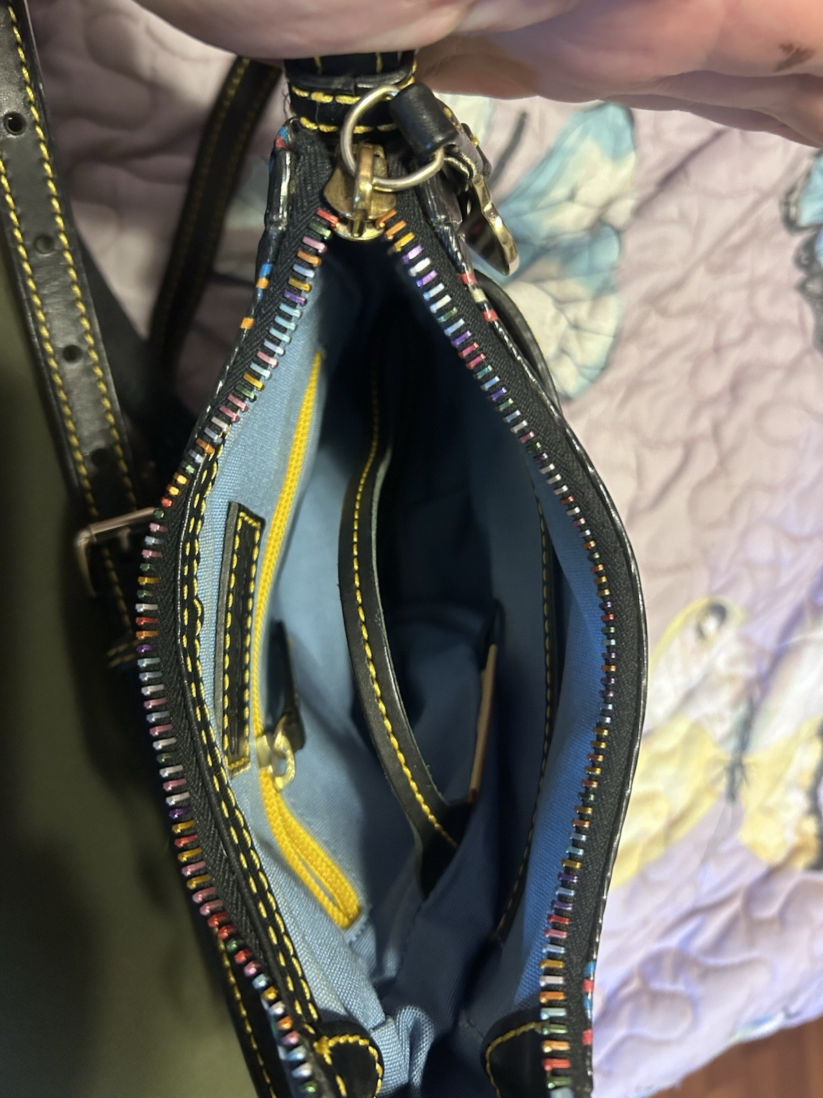 This Dooney & Bourke DB75 Multi rainbow logo crossbody bag