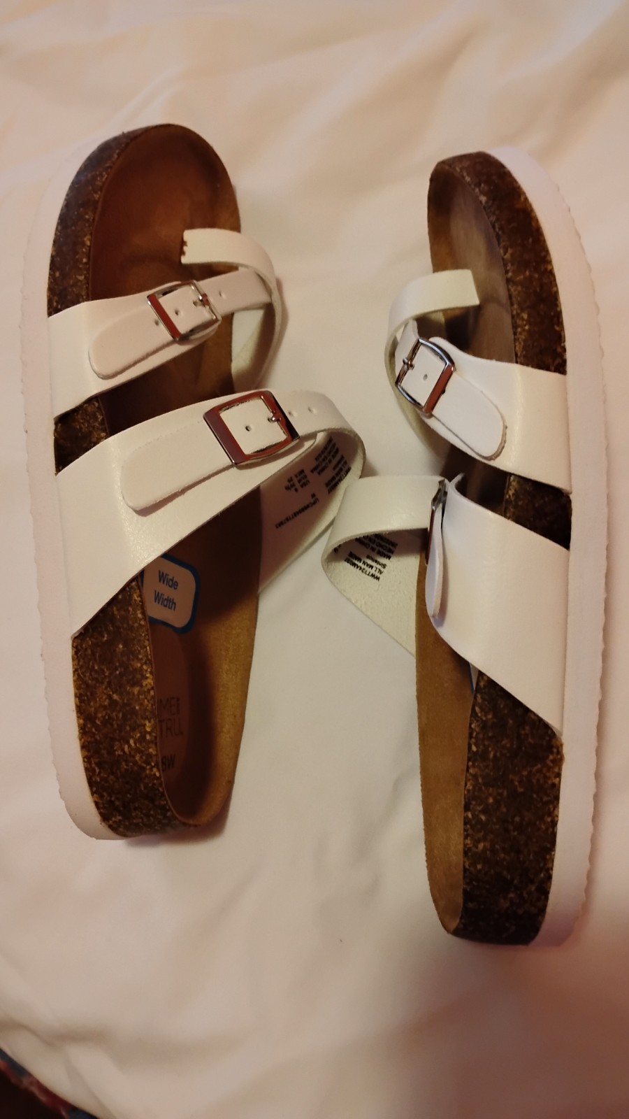 Open Toe And Open Back White Sandals With Buckles On Top