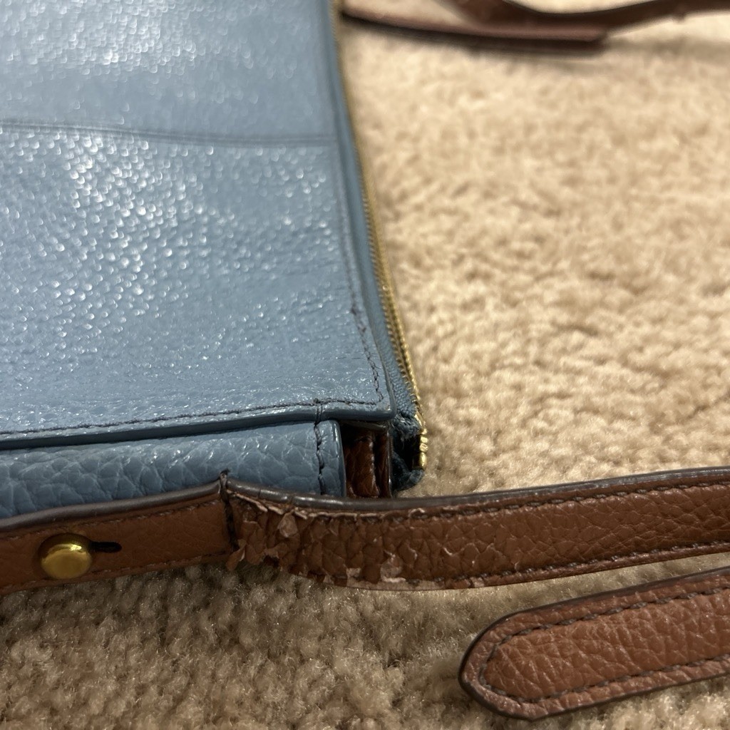 Fossil pebbled blue Gemma crossbody bag brown strap zip closure inner pockets