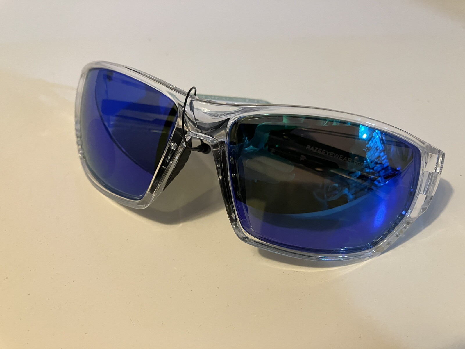 RAZE Eyewear Sunglasses Sonar Polarized Clear Frame Blue Mirror Smoke 28856