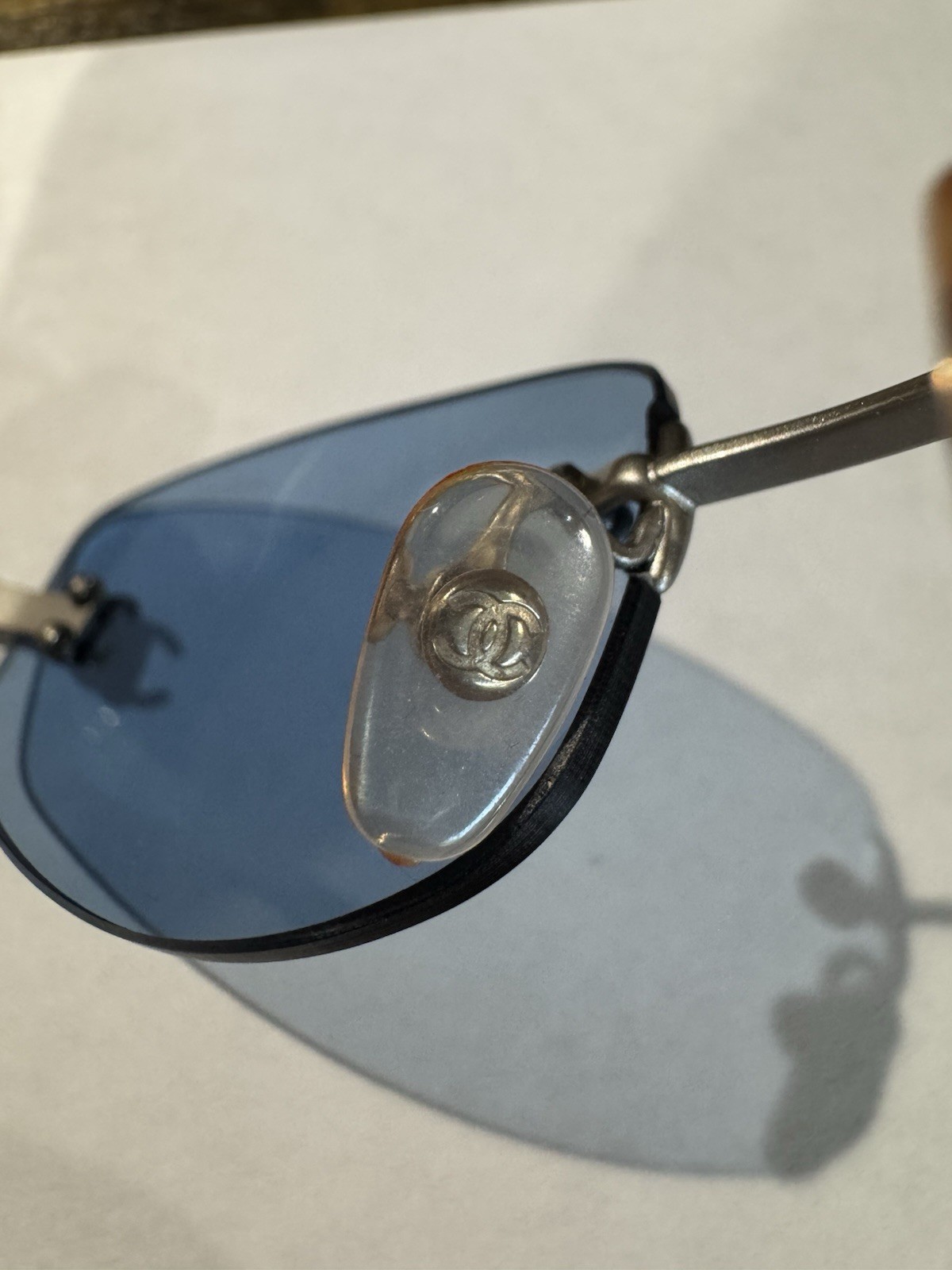Vintage CHANEL 4002 Rimless Sunglasses Tinted Blue Lenses Silver Metal Frame