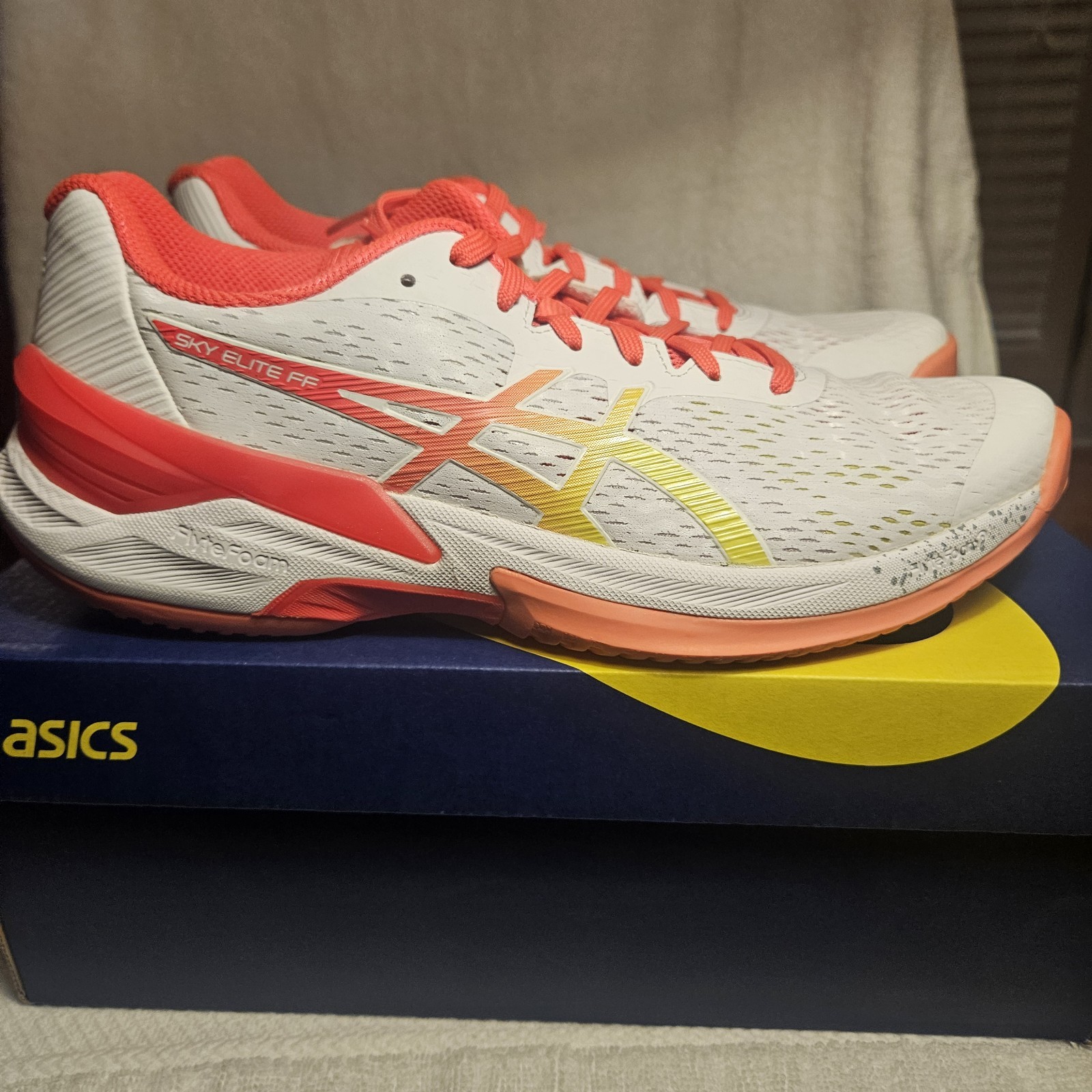 ASICS women’s Sky Elite FF Low Top Lace-Up Volleyball Sneakers White/Laser Pink