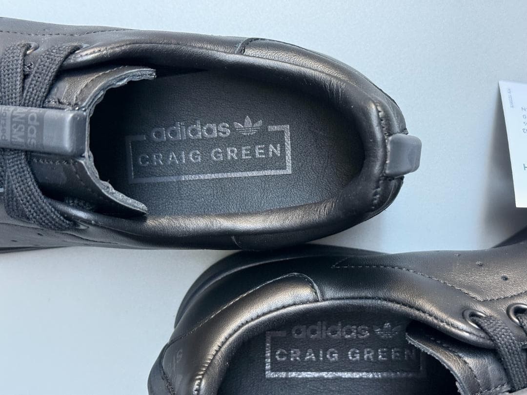 A classic split in half Collaboration Stan Smith black 10
