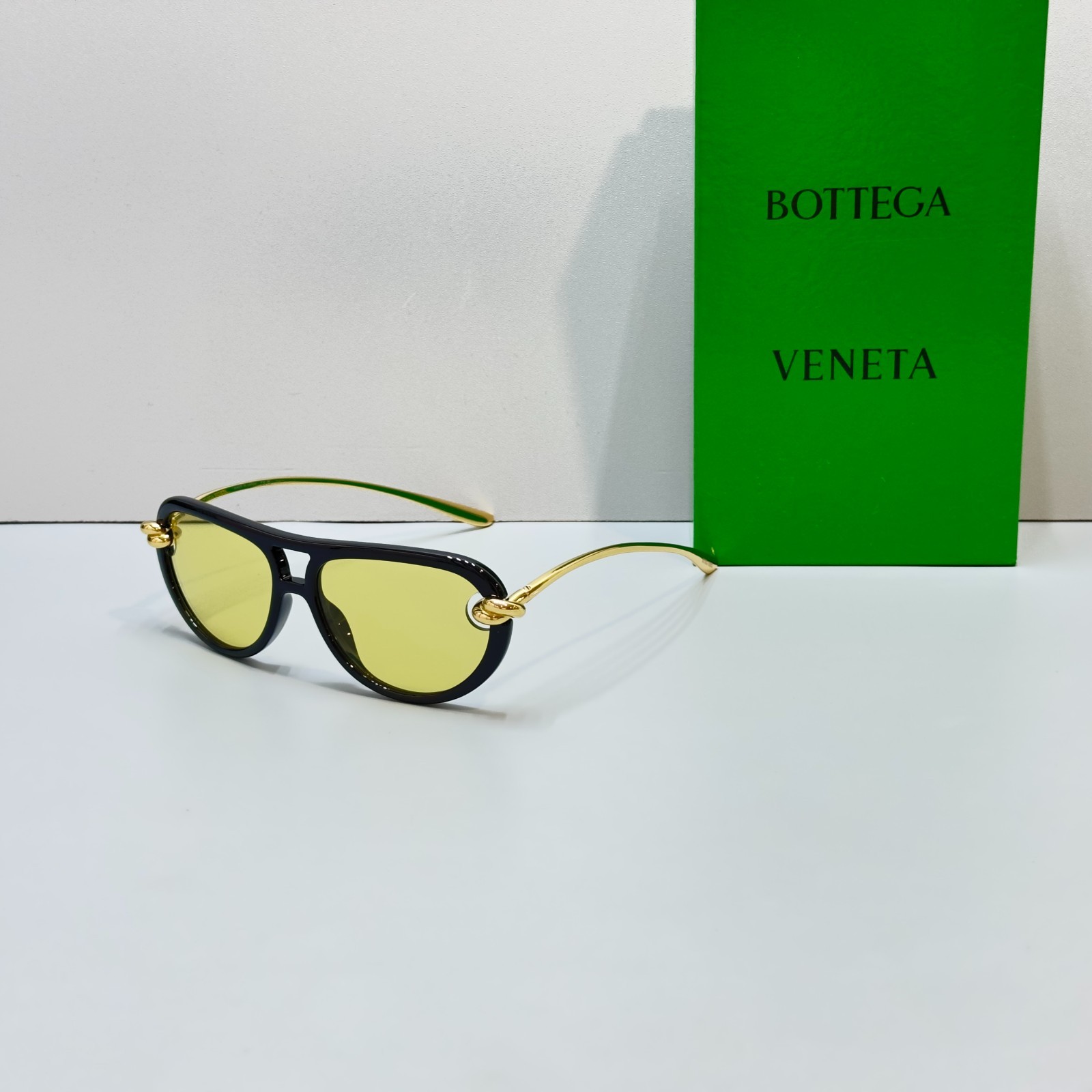 Bottega Veneta BV1418S Black Frame Yellow Lens Gold Knot Aviator Sunglasses