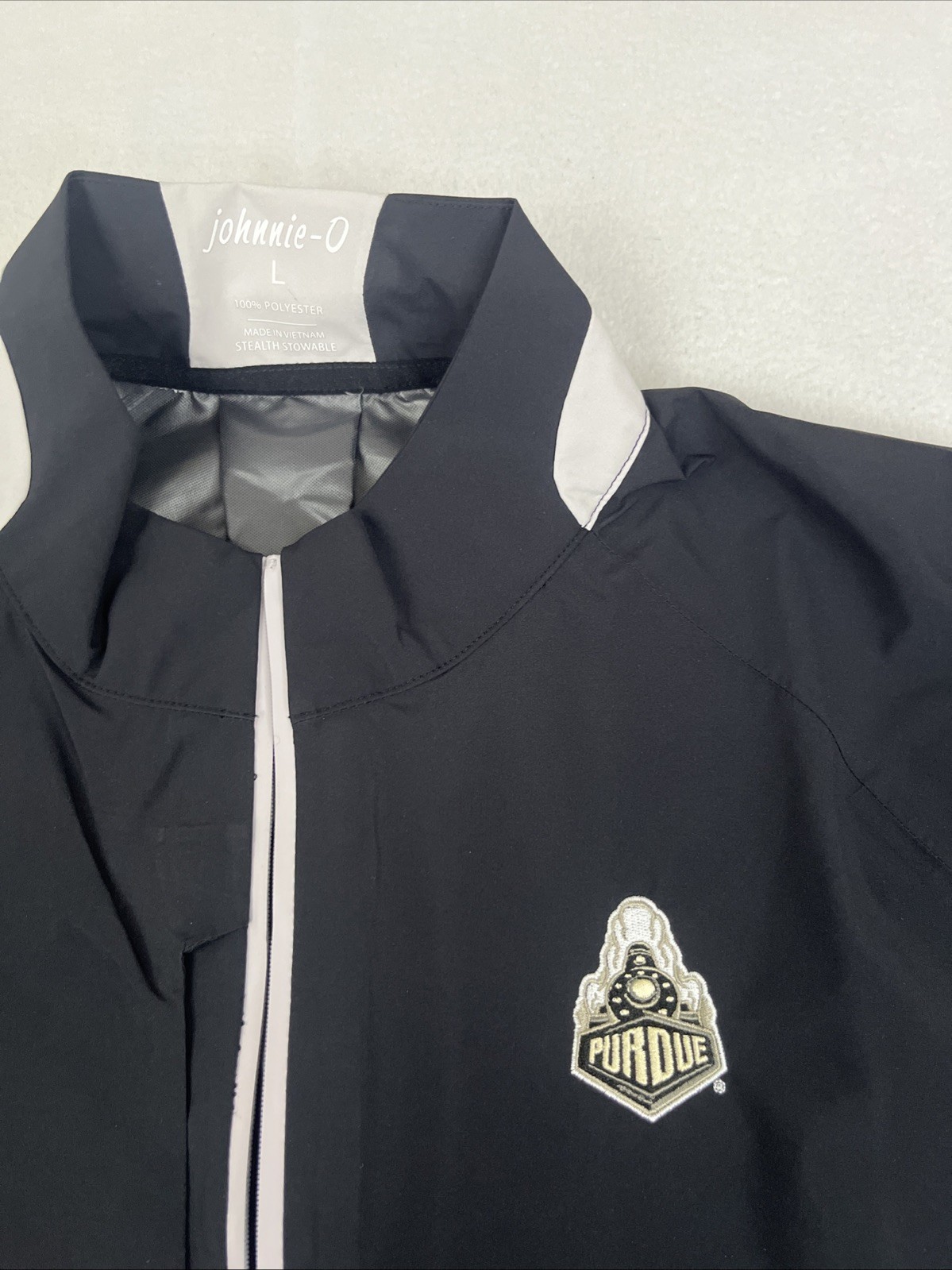 JOHNNIE-O STEALTH STOWABLE SHORT SLEEVE GOLF JACKET SZ L PURDUE BLACK