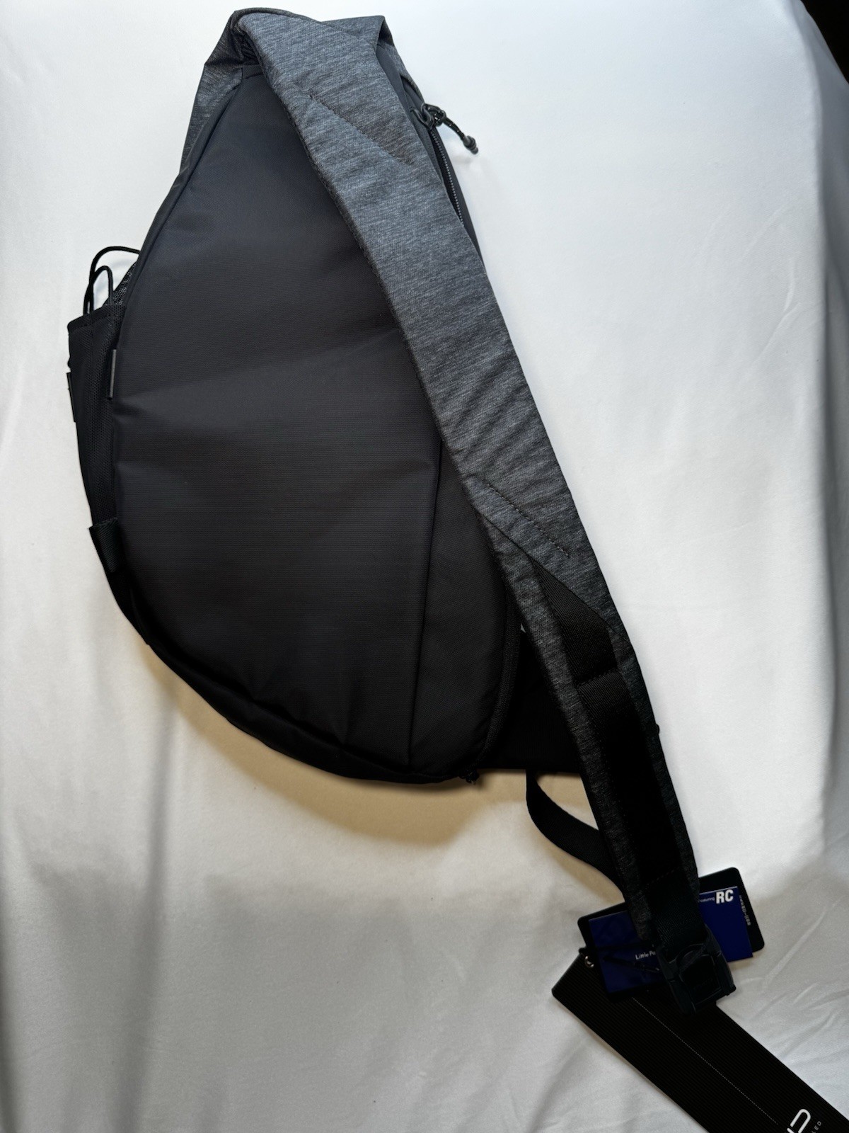 NIID Gray/Black Sling Bag, Zip Closure, Pockets, Adjustable Shoulder Strap, NEW