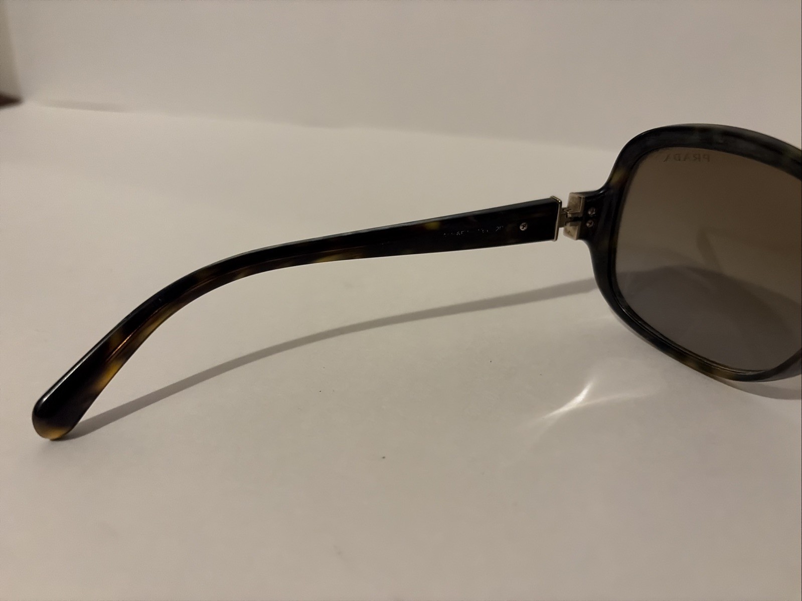 Prada SPR 17N Tortoise Brown Women’s Sunglasses 57mm 17mm 135mm