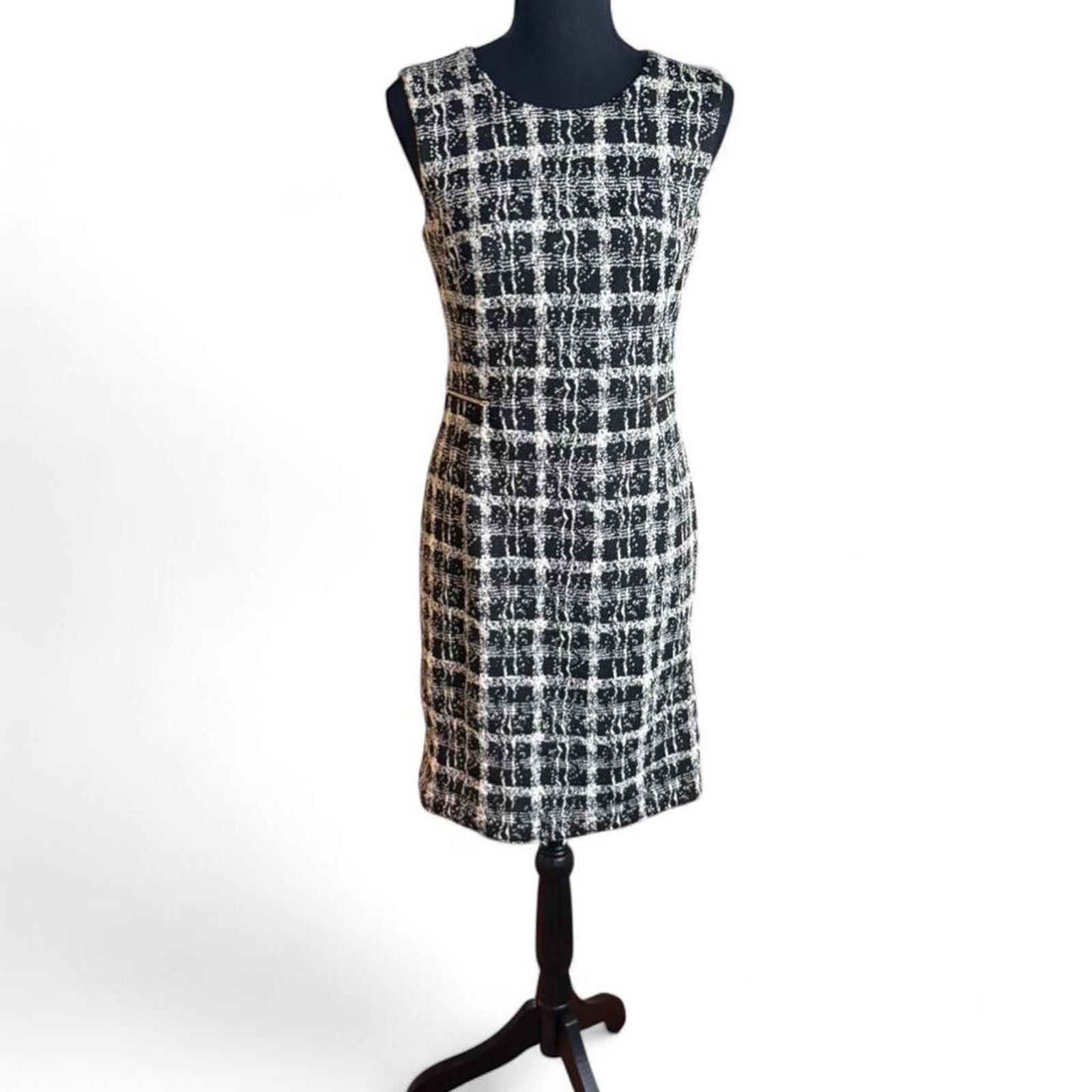 Calvin Klein form fitting dress, stretchy fabric lined size small