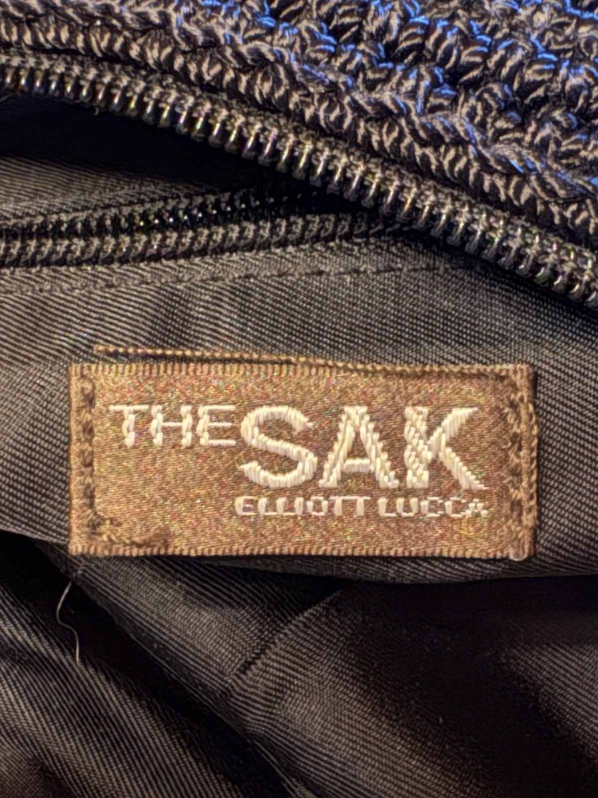 “The Sak Elliot Luca” Black Woven Bag 13 X 8.75 X 4” W/charm Excellent