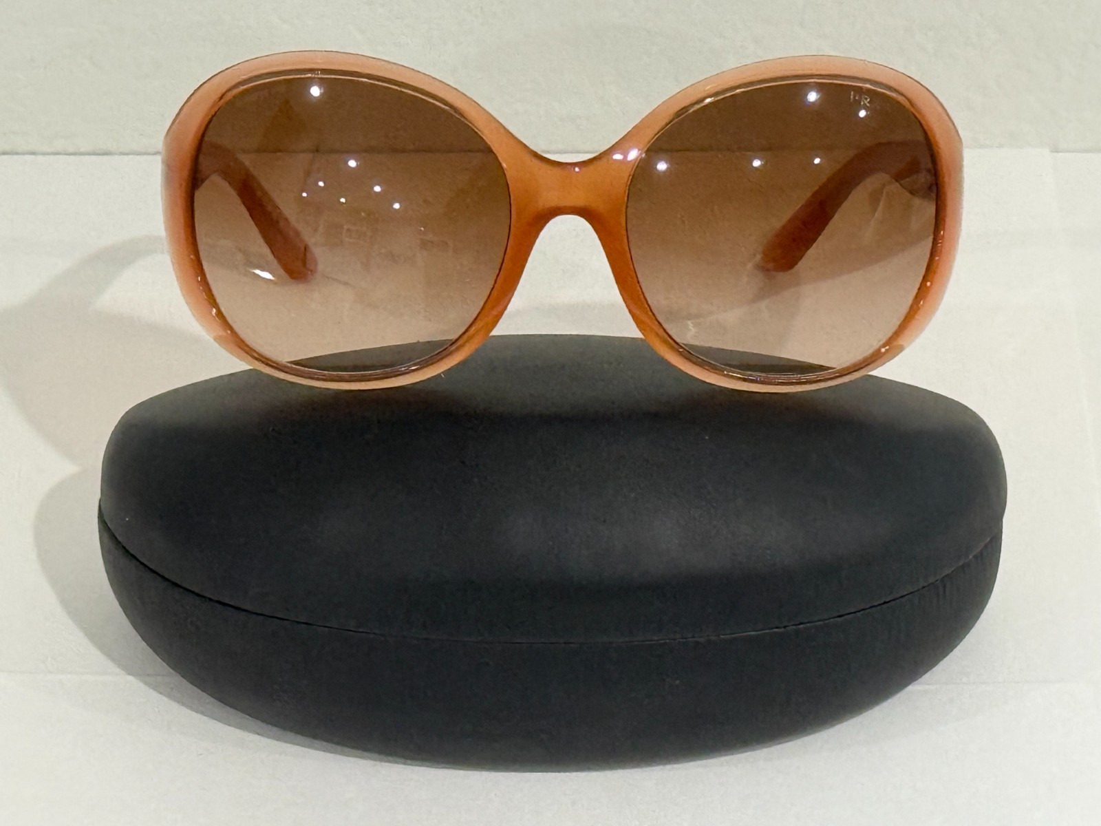 Prada Sunglasses SPR 04O semi-traslucent frame oversized rounded rims
