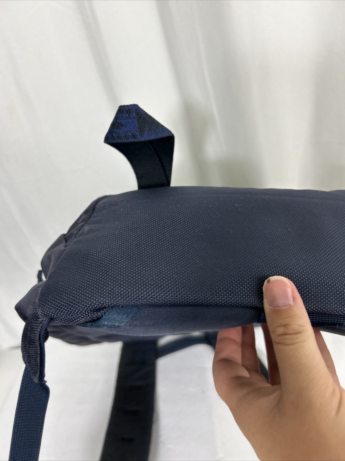 The North Face Lineage 20L backpack book bag navy used Flaw Small Rip On Side