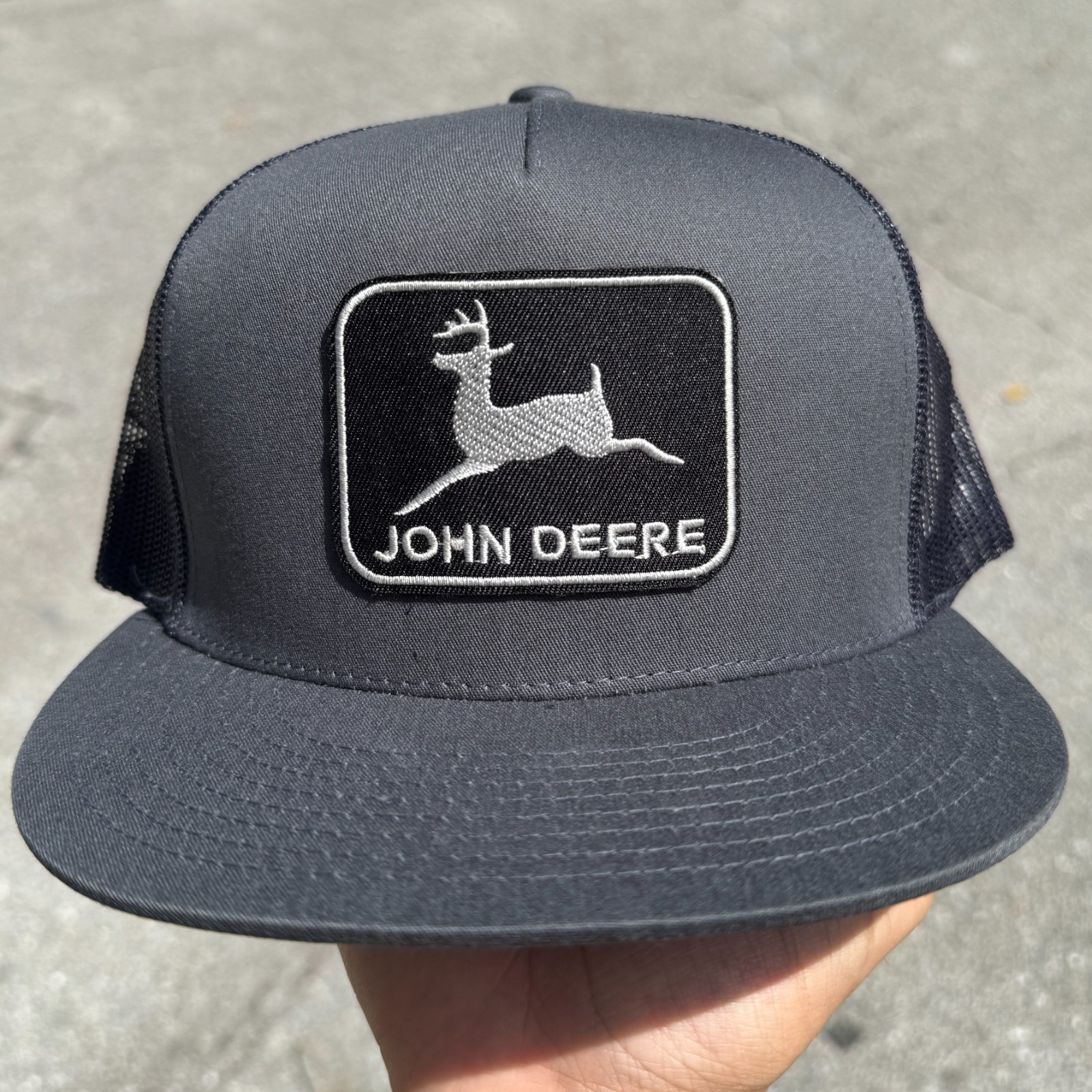 John Deere Black Patch on Yupoong Trucker Hat / YP Classic 6006 Snapback Cap