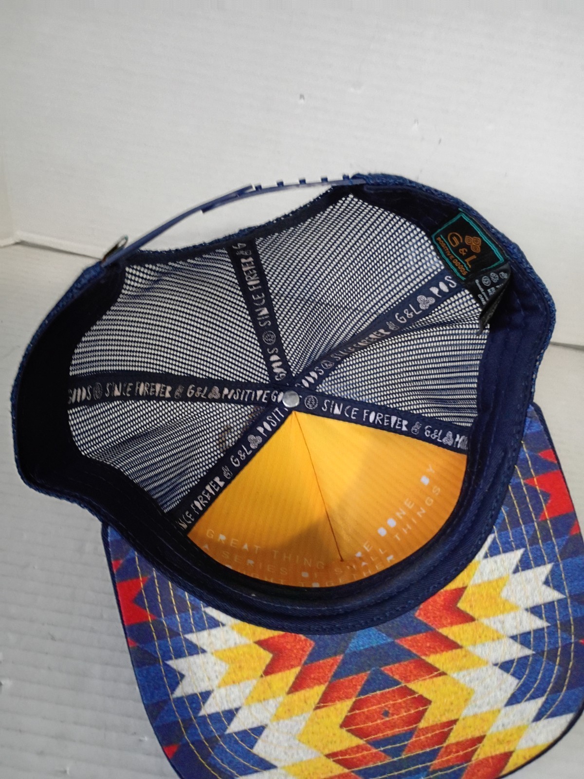 G&L Trucker Hat Santa Fe Positive Goods mesh snap-back blue red yellow adult