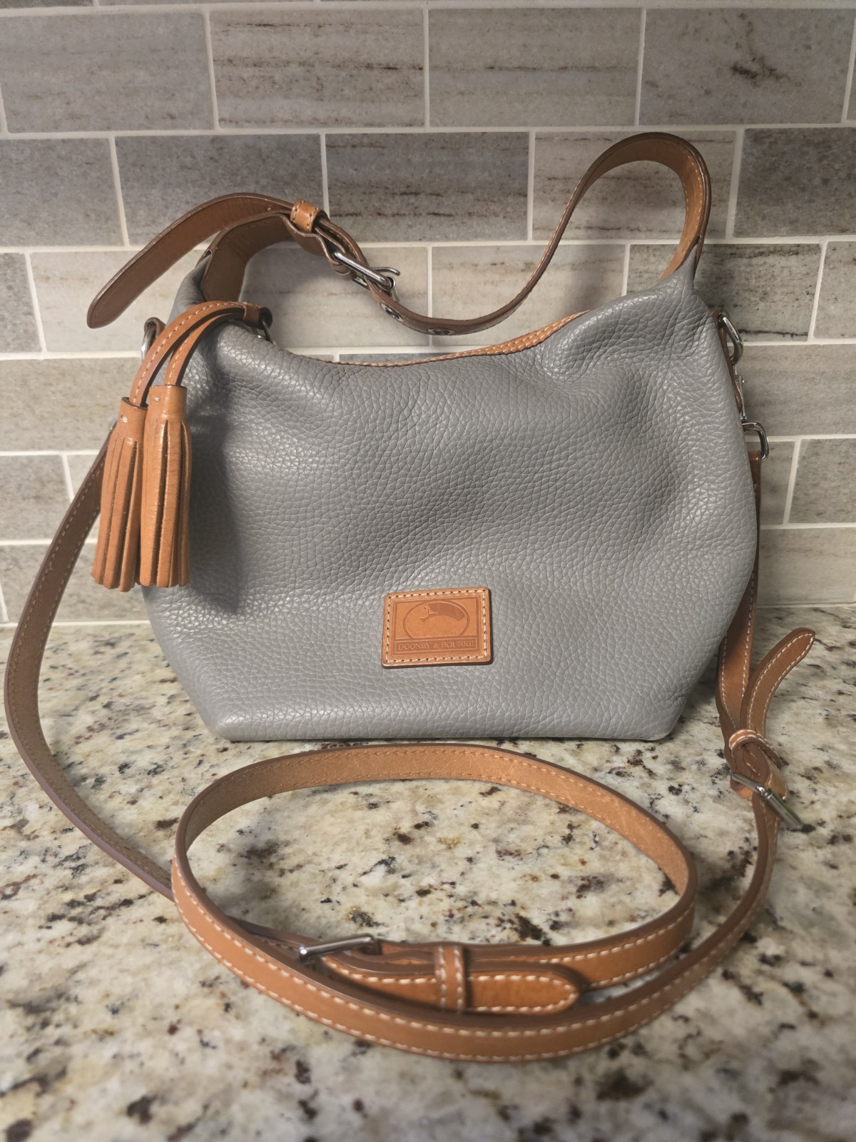 Dooney & Bourke Gray Pebbled Crossbody Bag Zip Tassel Charm Silver Hardware