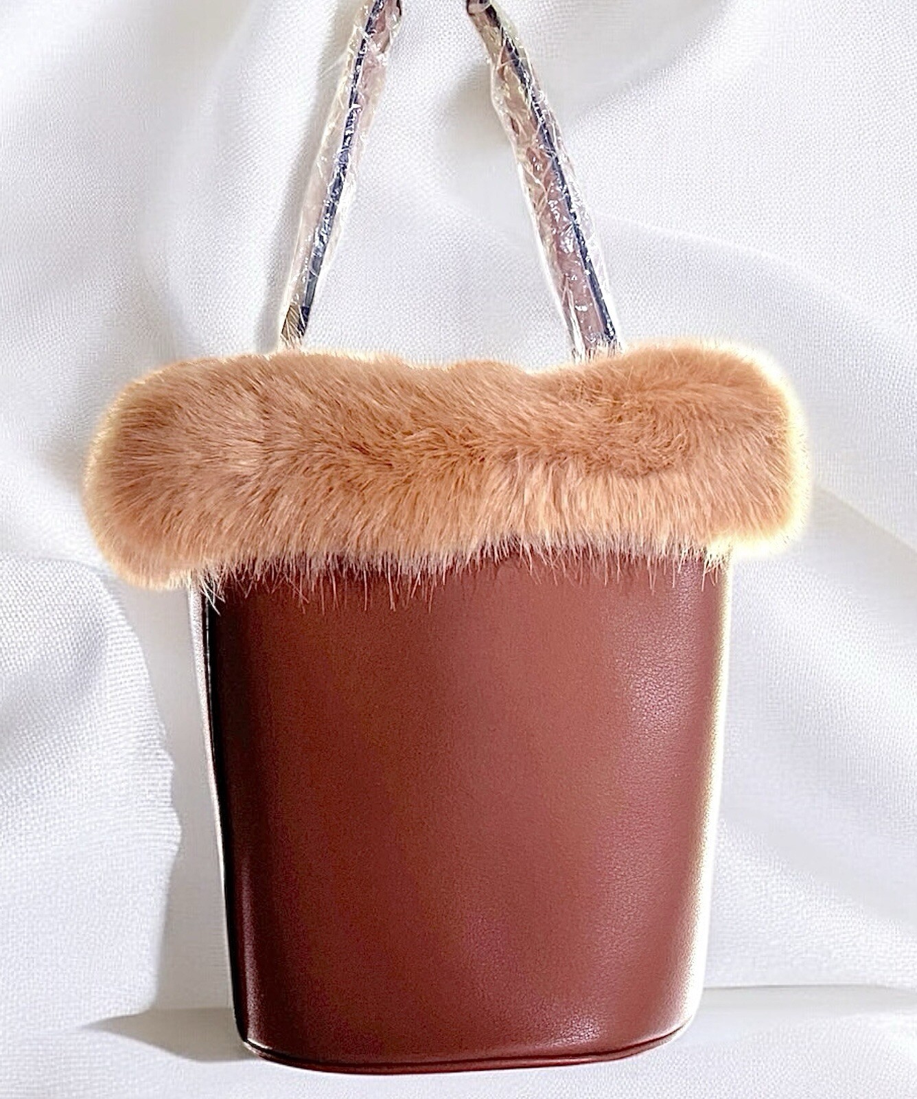 Faux Fur & Faux Leather Bucket Bag w/drawstring closure and Top Handle. Pomelo