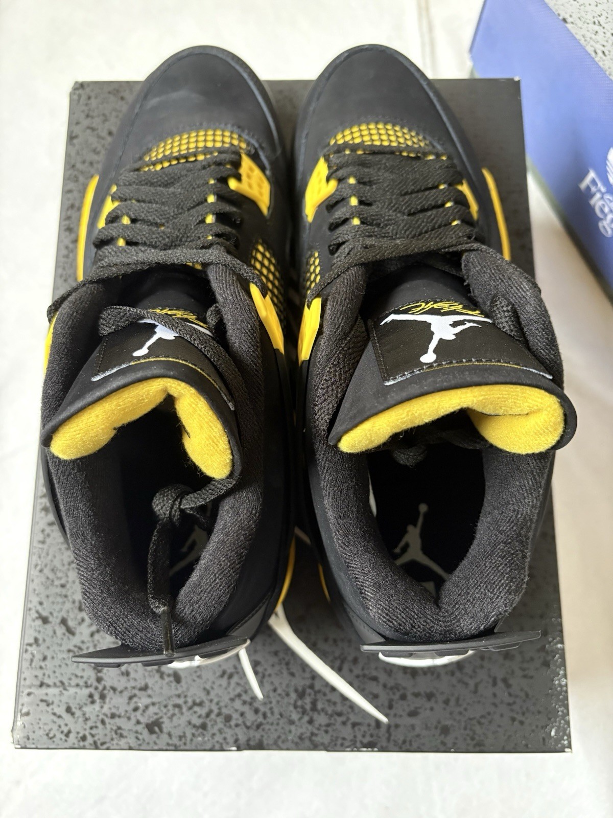 Size 11.5 – Jordan 4 Retro Mid Thunder