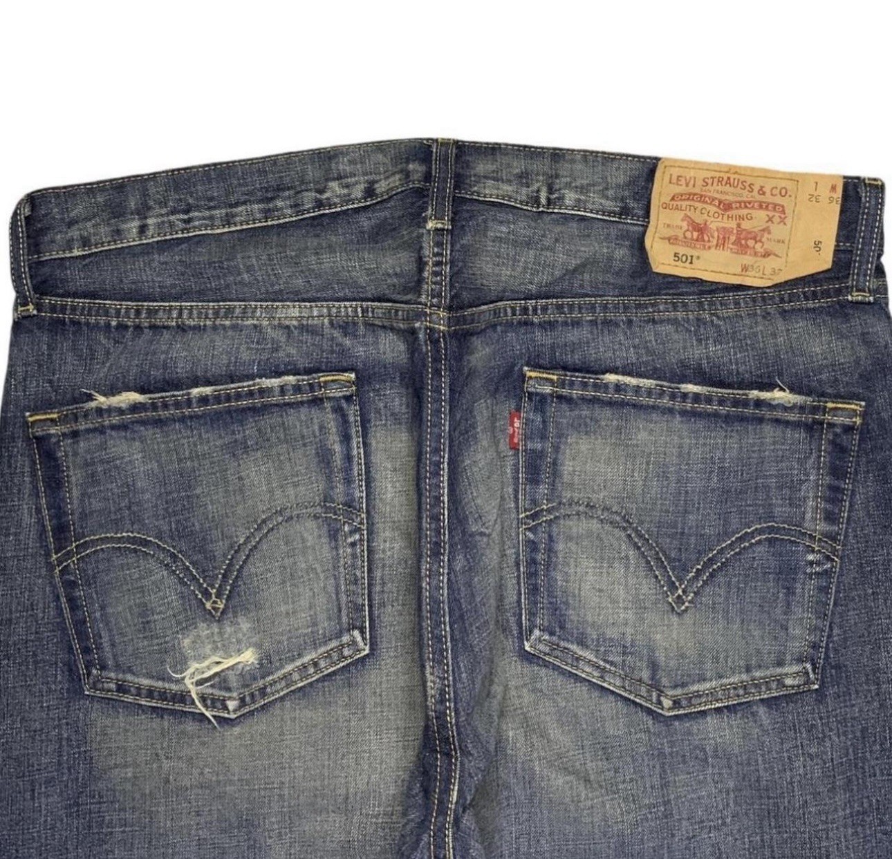 Levi’s 501 Men’s Blue Medium Wash Straight Leg Distressed Denim Jeans