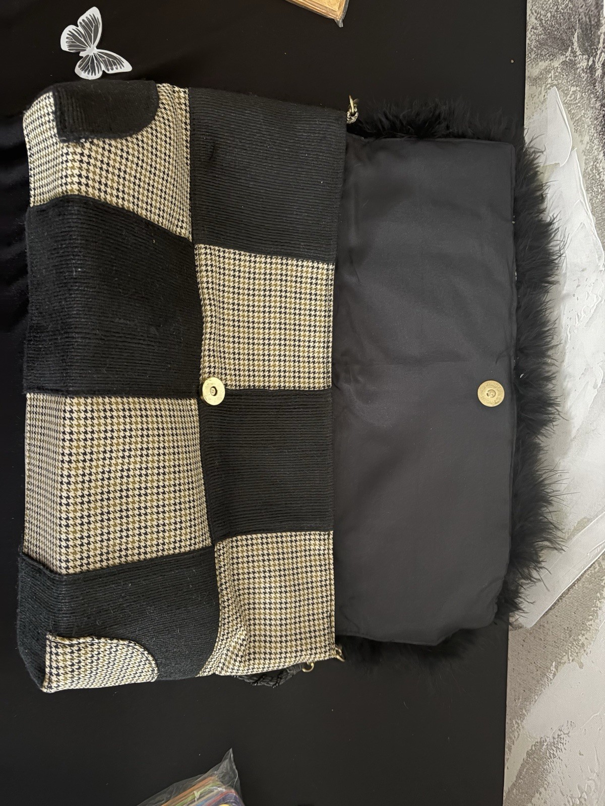Elevate your style with this chic black and tan checkered women’s Handbag