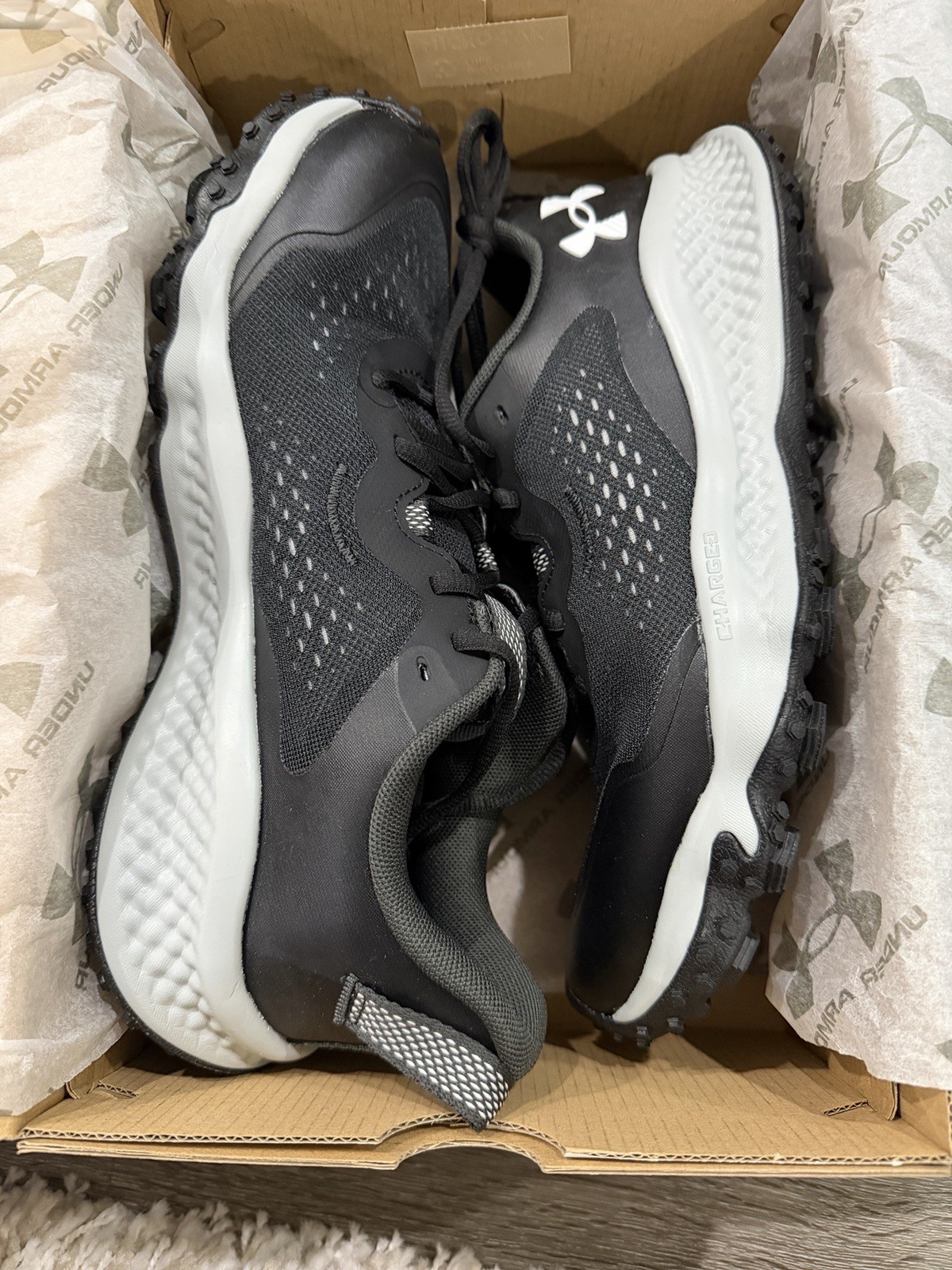 Size 8 – Under Armour Charged Trail. 8.5 black And Grey