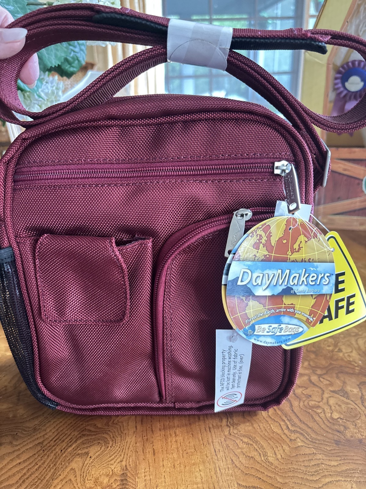 DayMakers Anti-Theft Crossbody Bag in Wine with RFID Security – NEW with tags