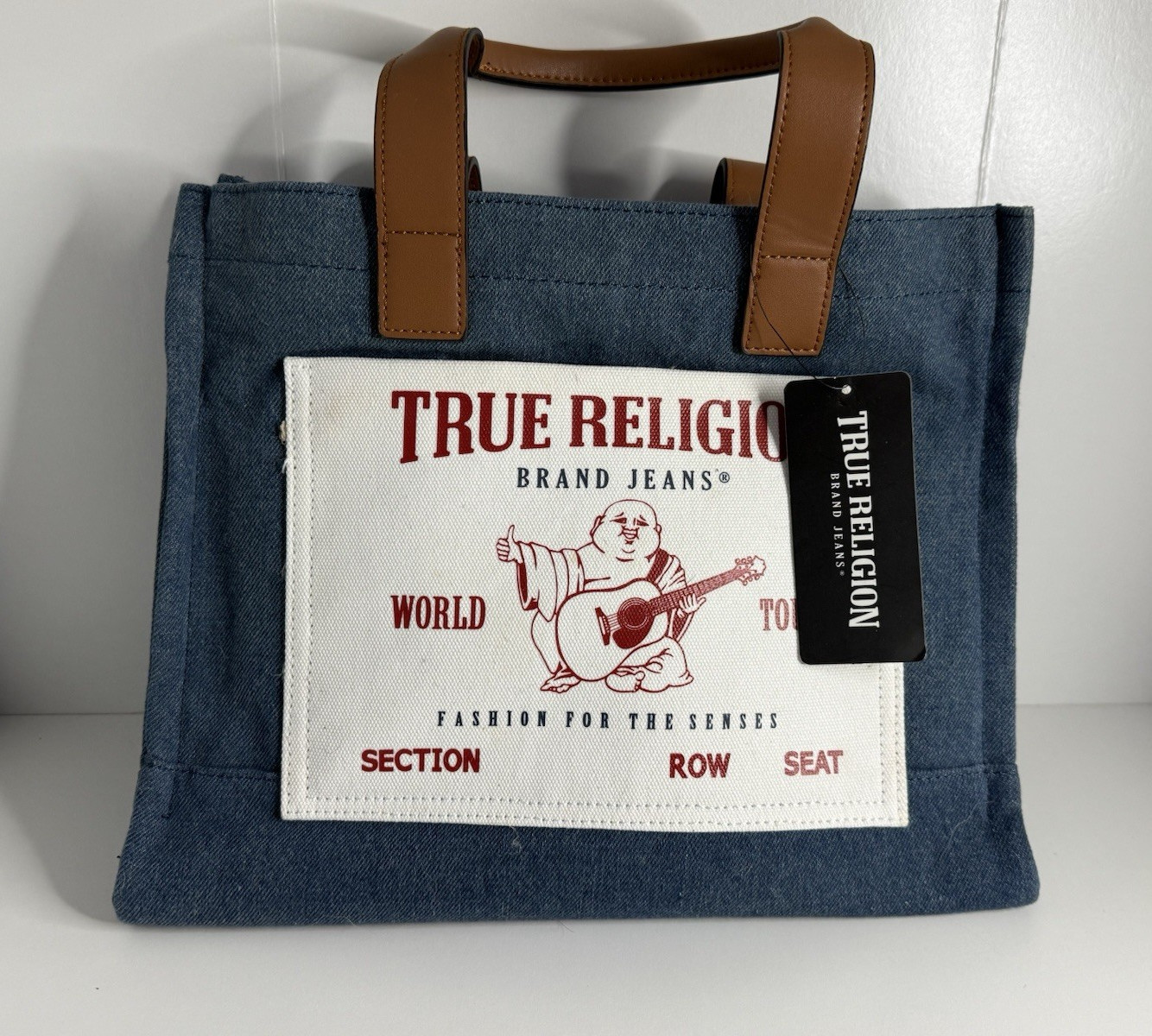 True Religion Blue Medium Tote Bag Zip/Magnetic, Lined Pockets, Strap, Brown