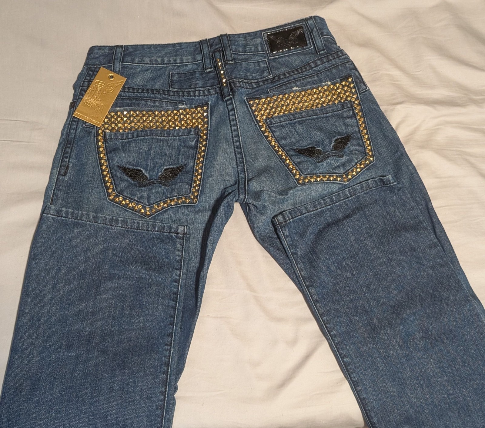 Robin’s Jean rare discontinued waist 34 gold studded back Pockets medium wash