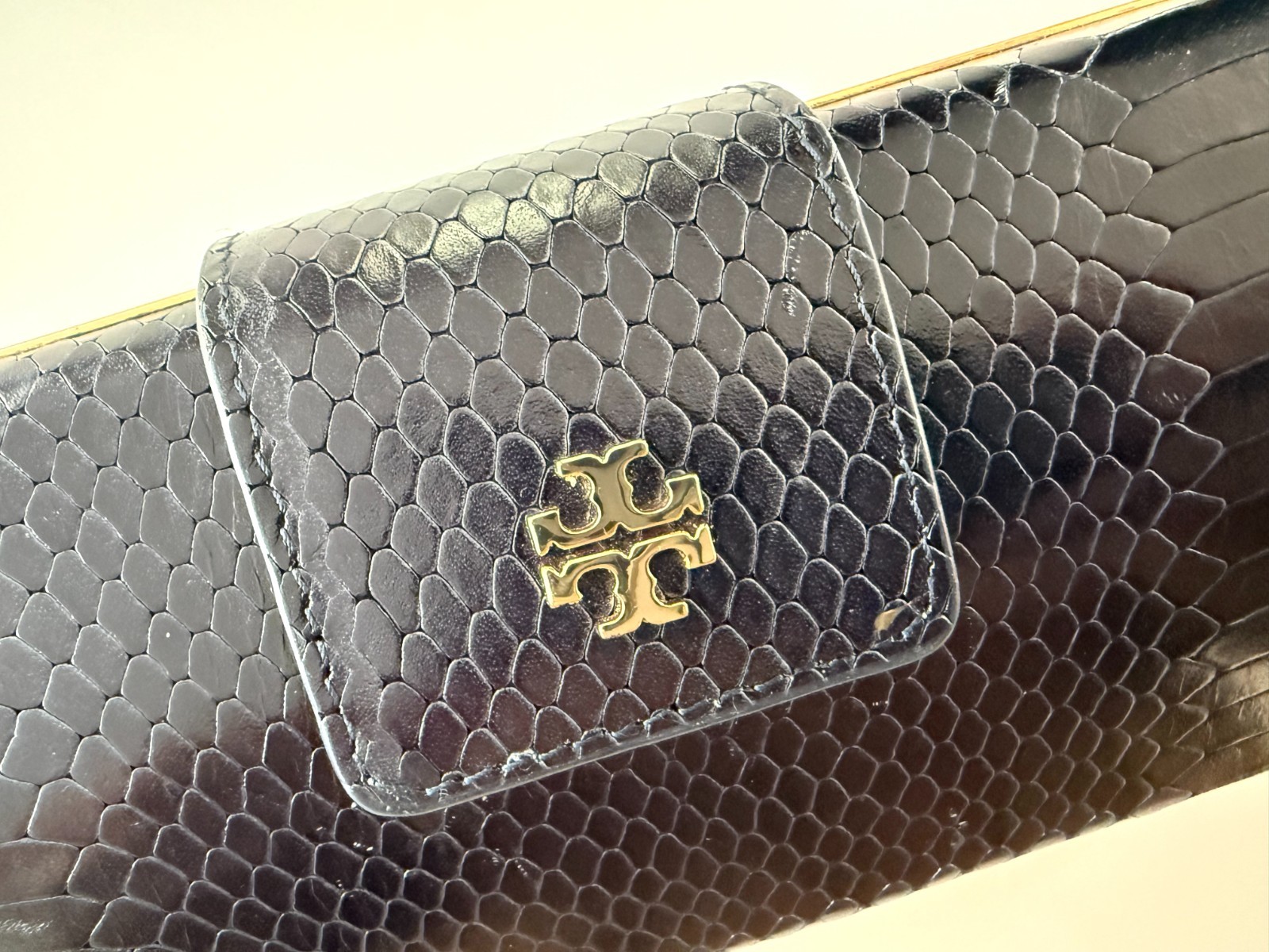 Tory Burch Embossed Black Leather Hard Shell Clutch with Gold Trim and Gold Logo