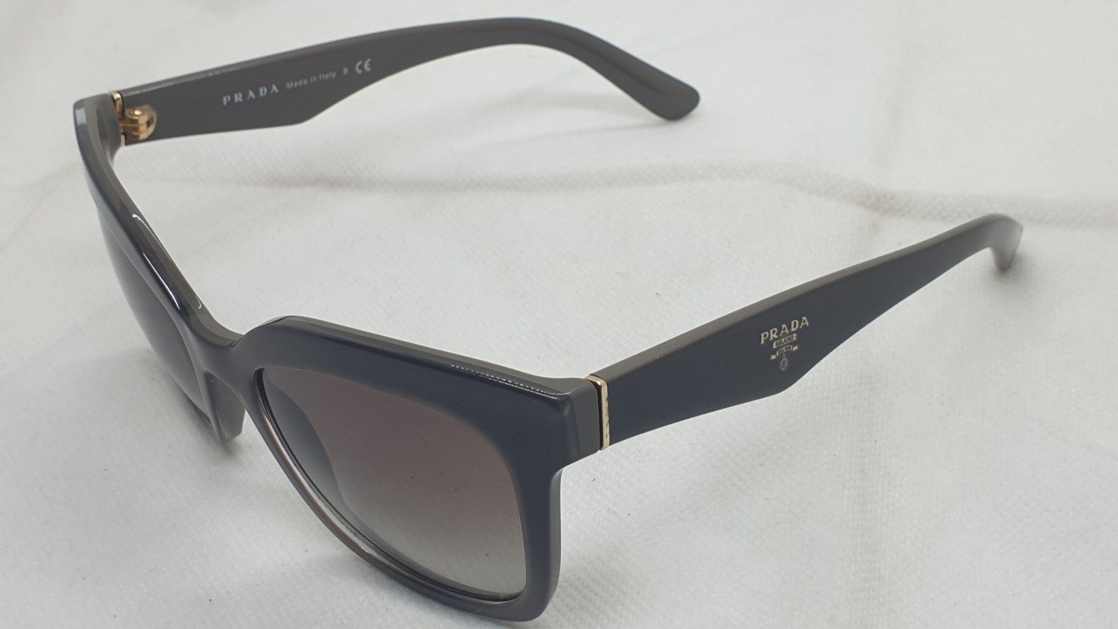 Prada SPR 24Q UAM-0A7 Sunglasses. Made in italy