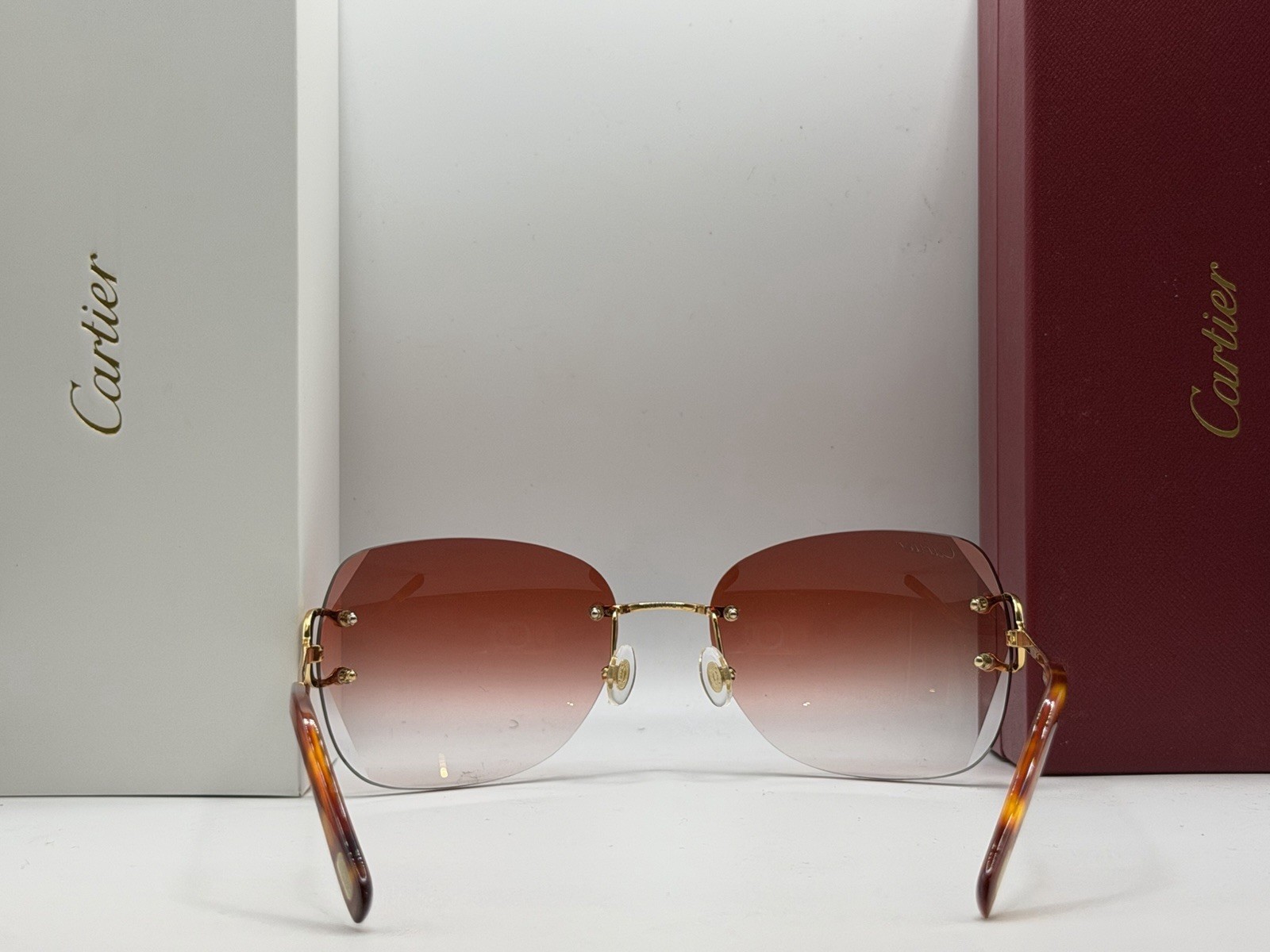 Cartier Rimless Square Gradient Red Unisex Sunglasses Gold Metal Frame CT00920