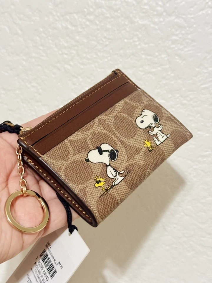 Coach X Peanuts Mini Skinny Id Case In Signature Canvas With Snoopy Print