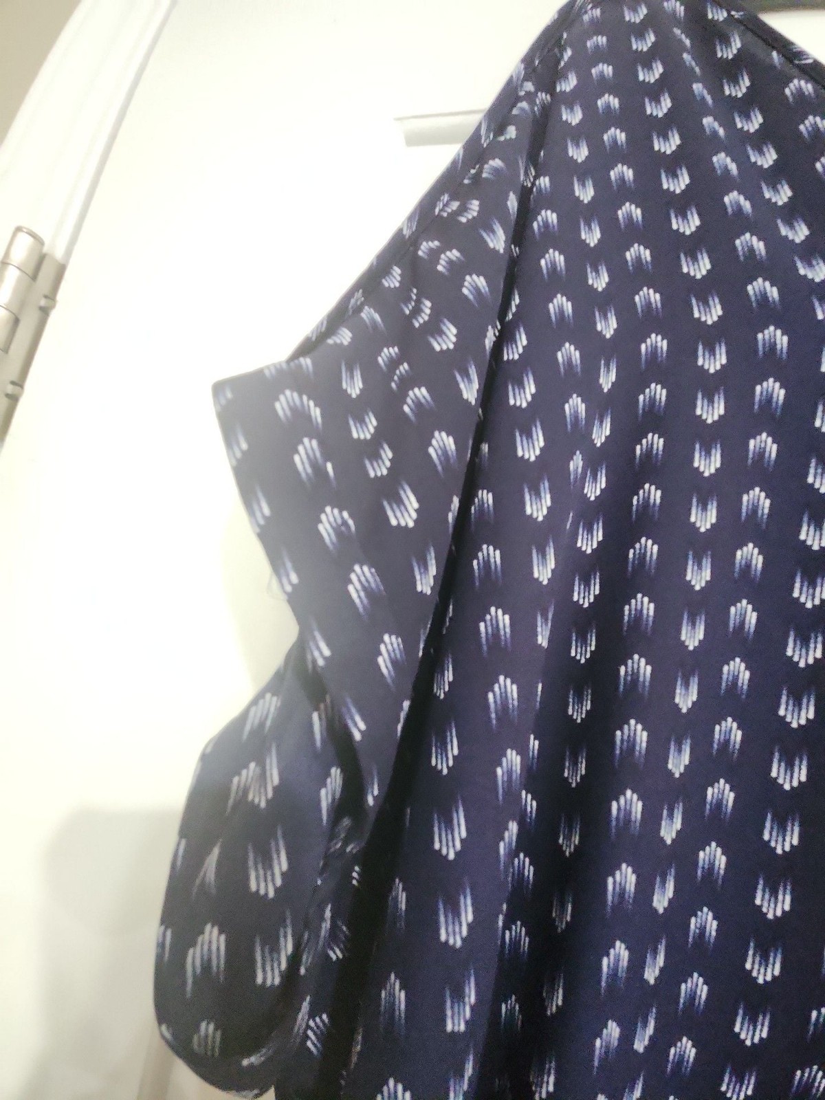 maurices navy blue and white ikat print v-neck blouse with chest pocket