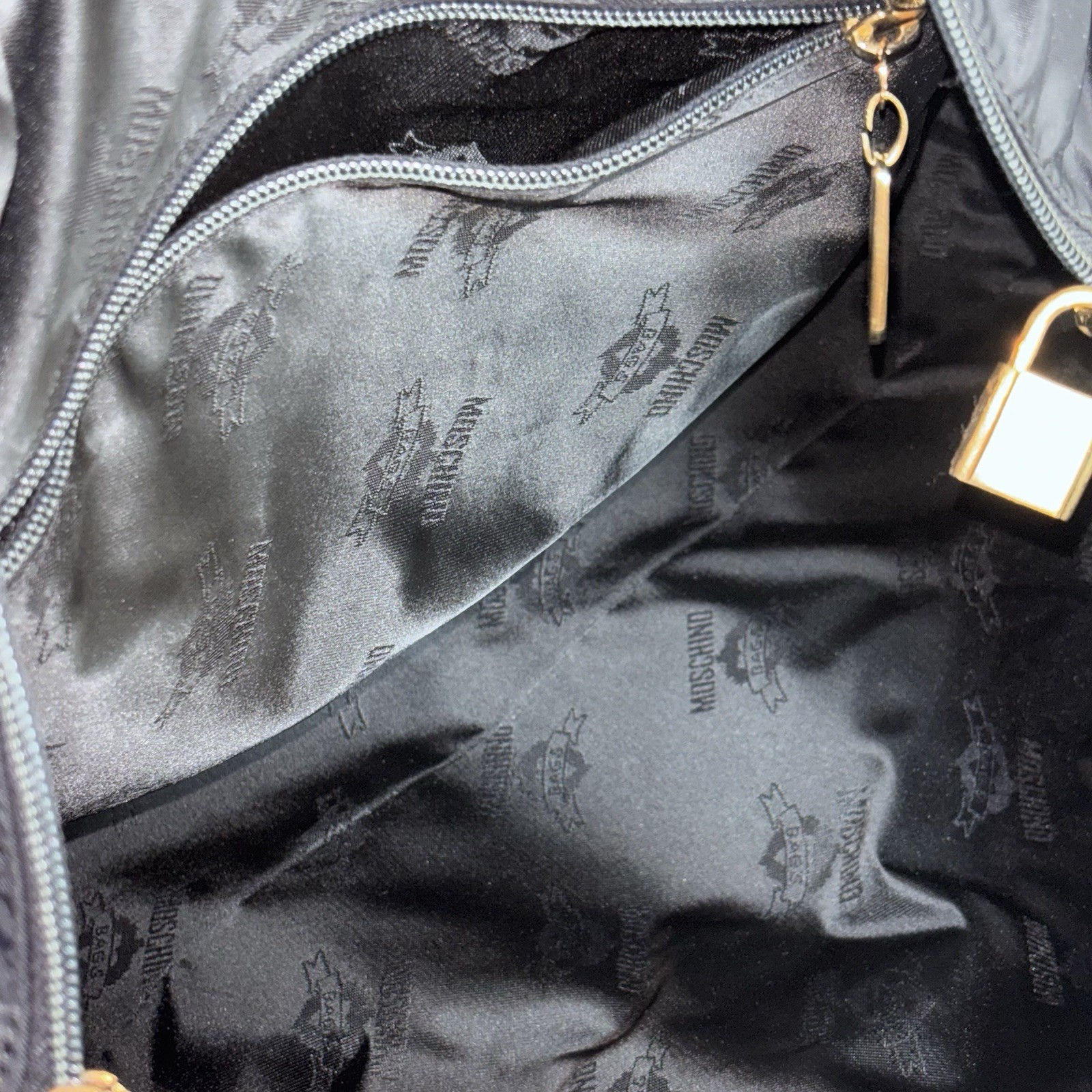 Moschino Redwall Italy Black Nylon Leather Block Leather Duffle Tote Bag “READ”