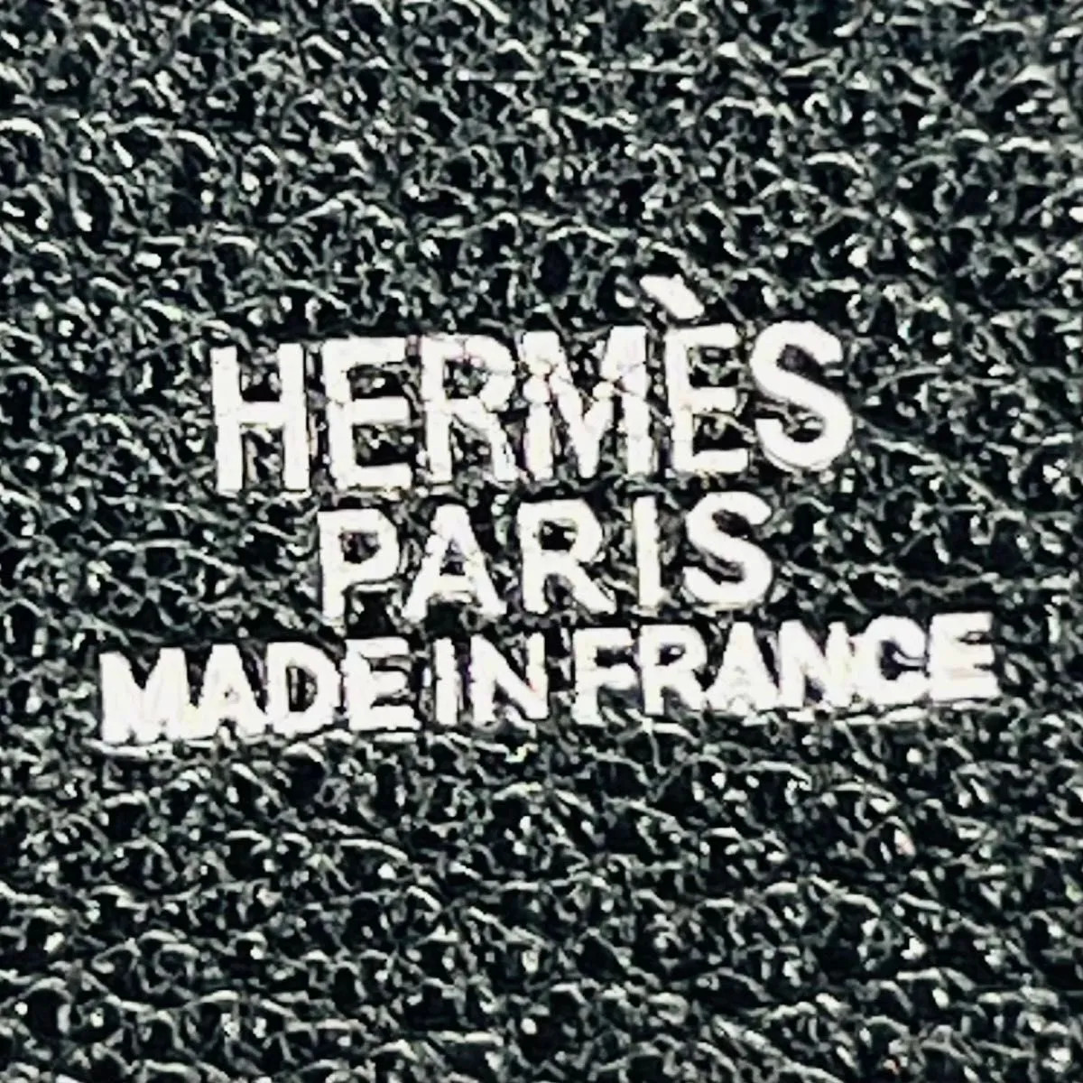 HERMES Bastia H-engraved Coin Purse Black Leather
