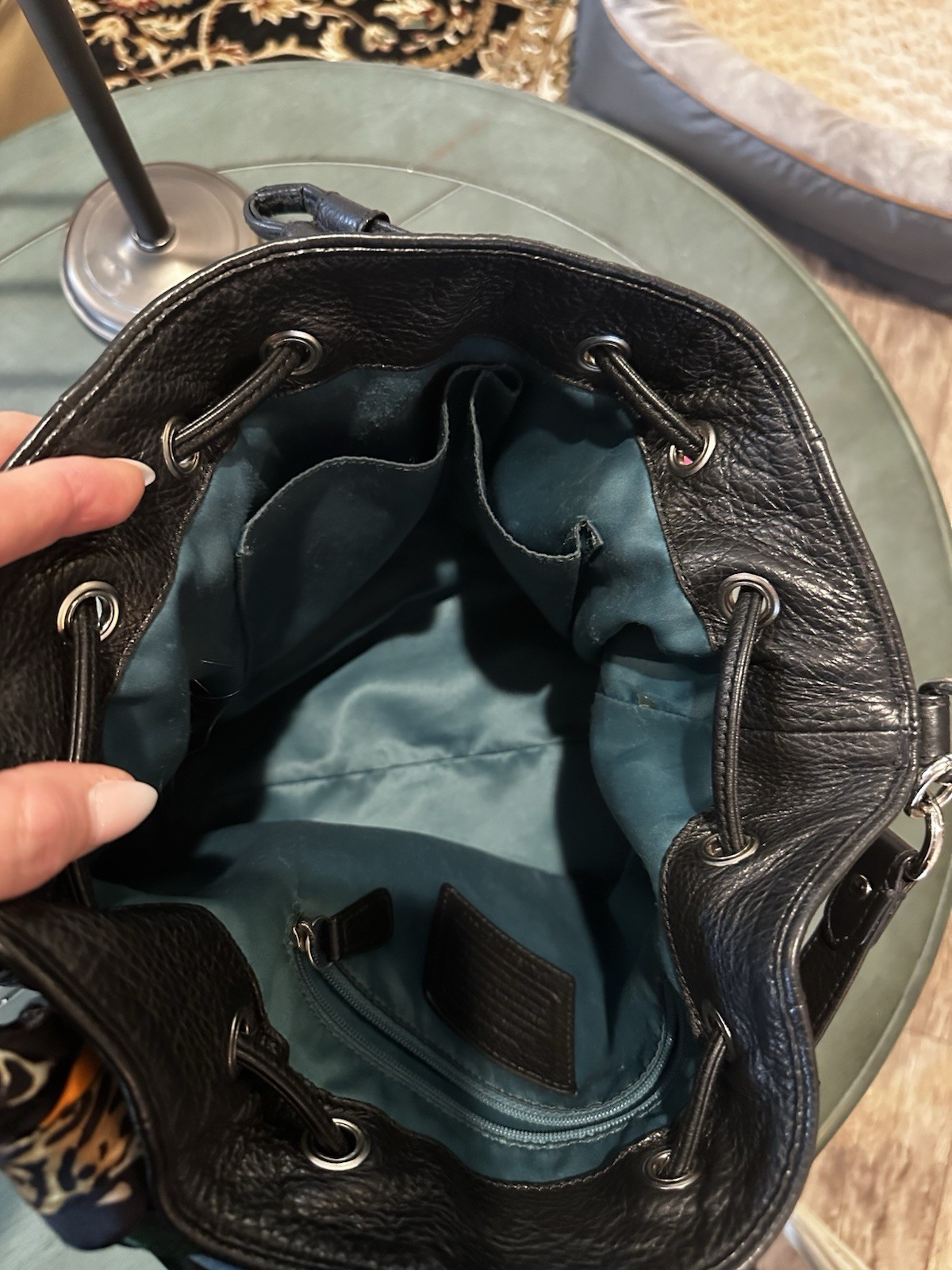 Coach Avery bucket bag. Drawstring closure and silver-tone hardware.