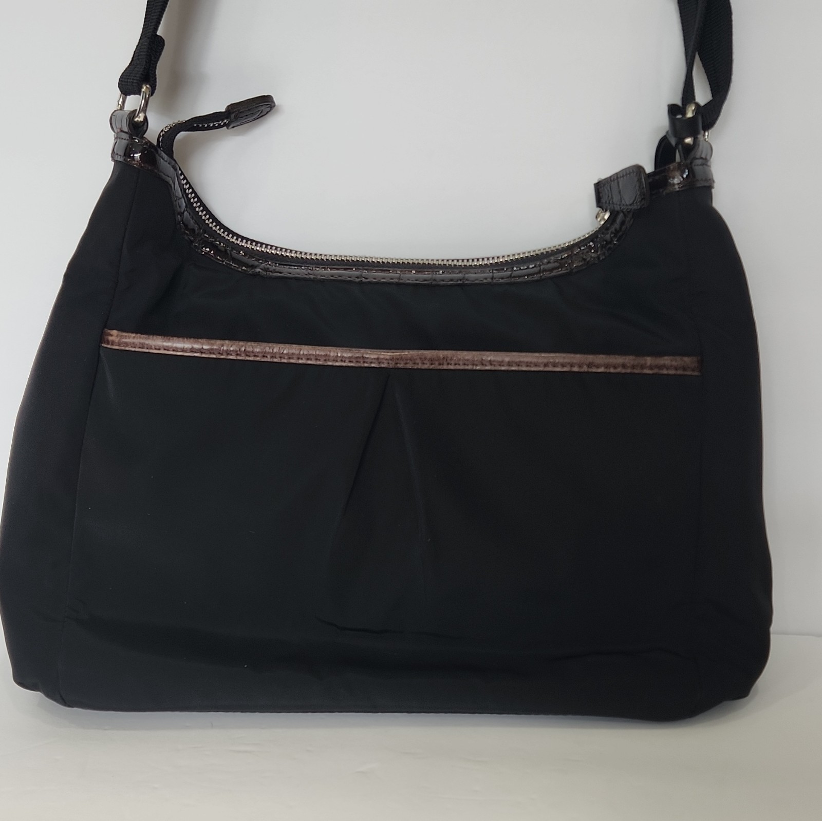 Brighton Black Crossbody Bag, Adjustable Strap, Zip, Pockets, Charm
