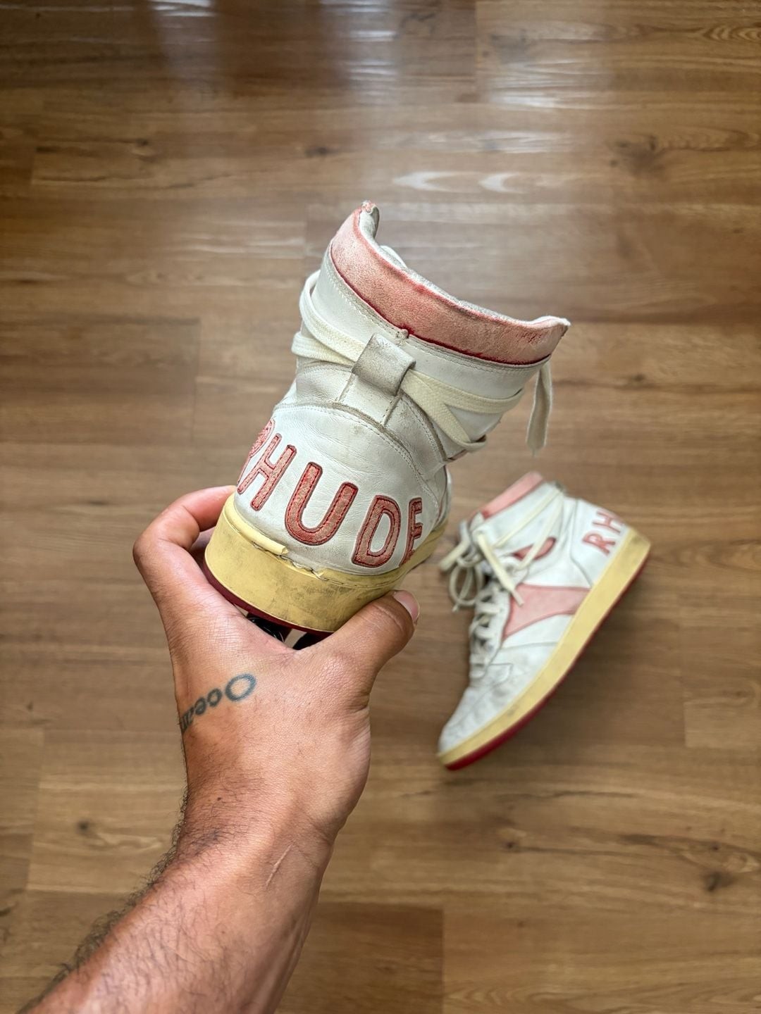 Rhude Rhecess High-Top Sneakers in White and Red