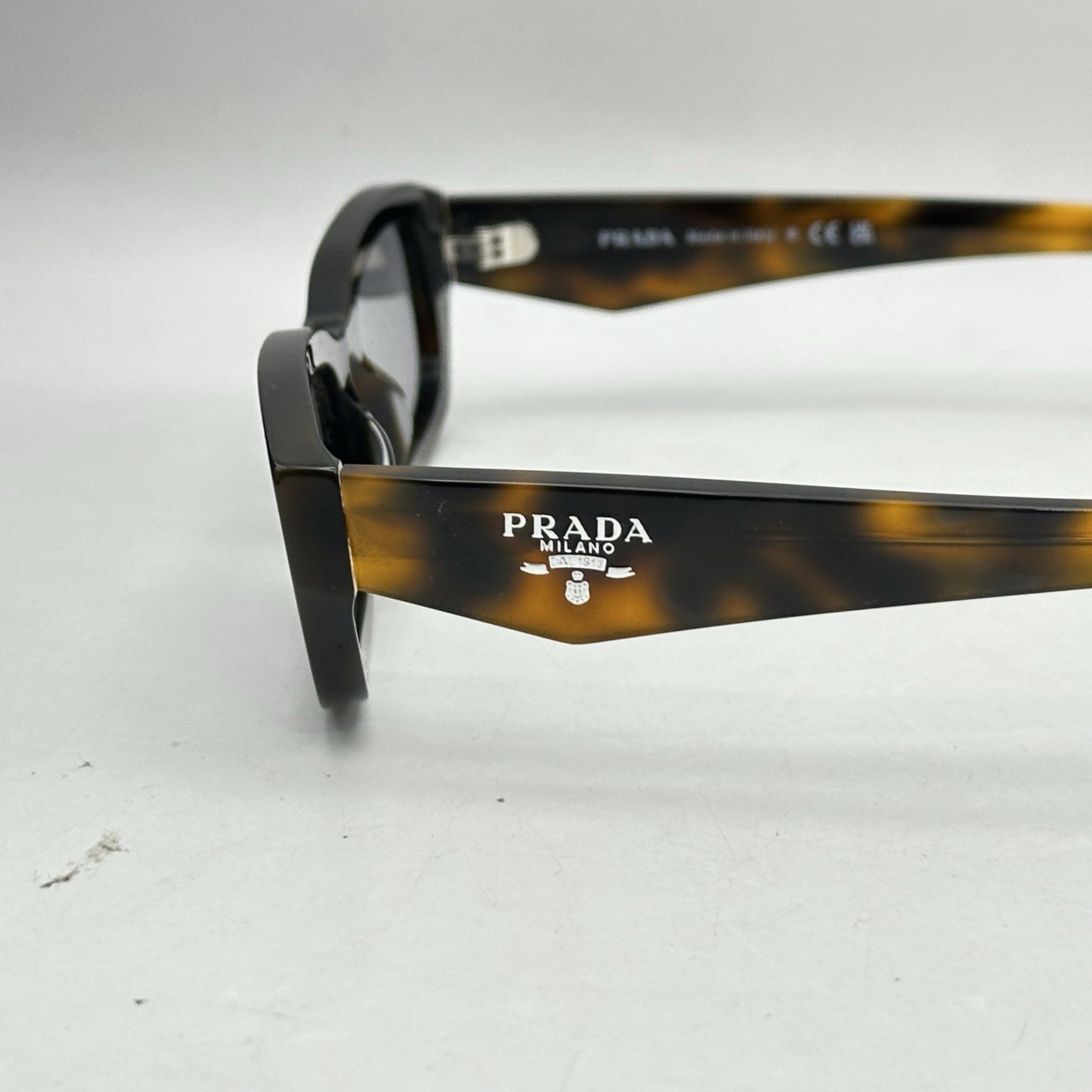 Prada Unisex Narrow Rectangle Thick Sunglasses SPRB06S Juniper Tortoise/Gray