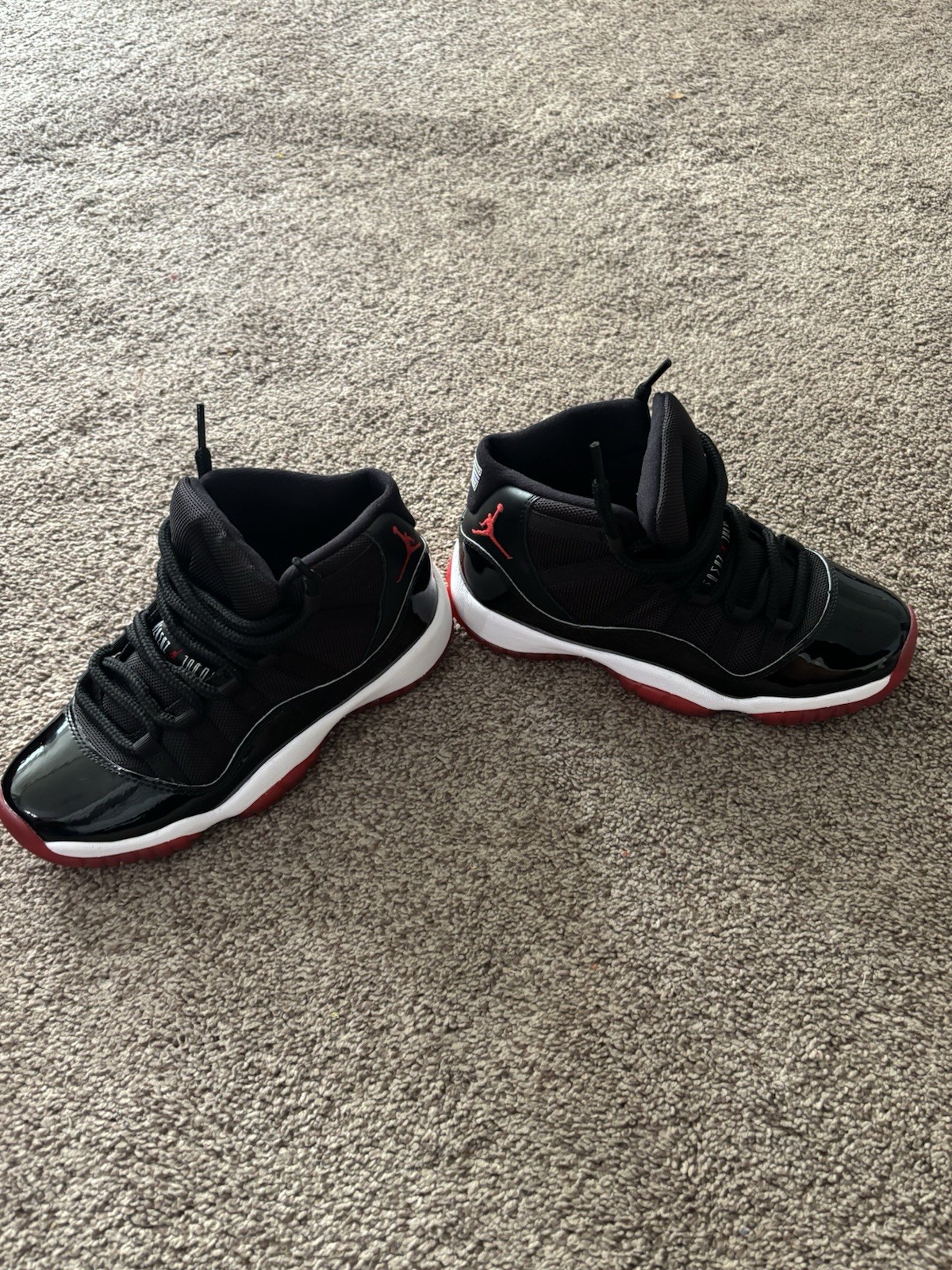 Jordan Air Jordan 11 Retro Mid Top Lace-Up Sneaker Black/Red/White 378038-061