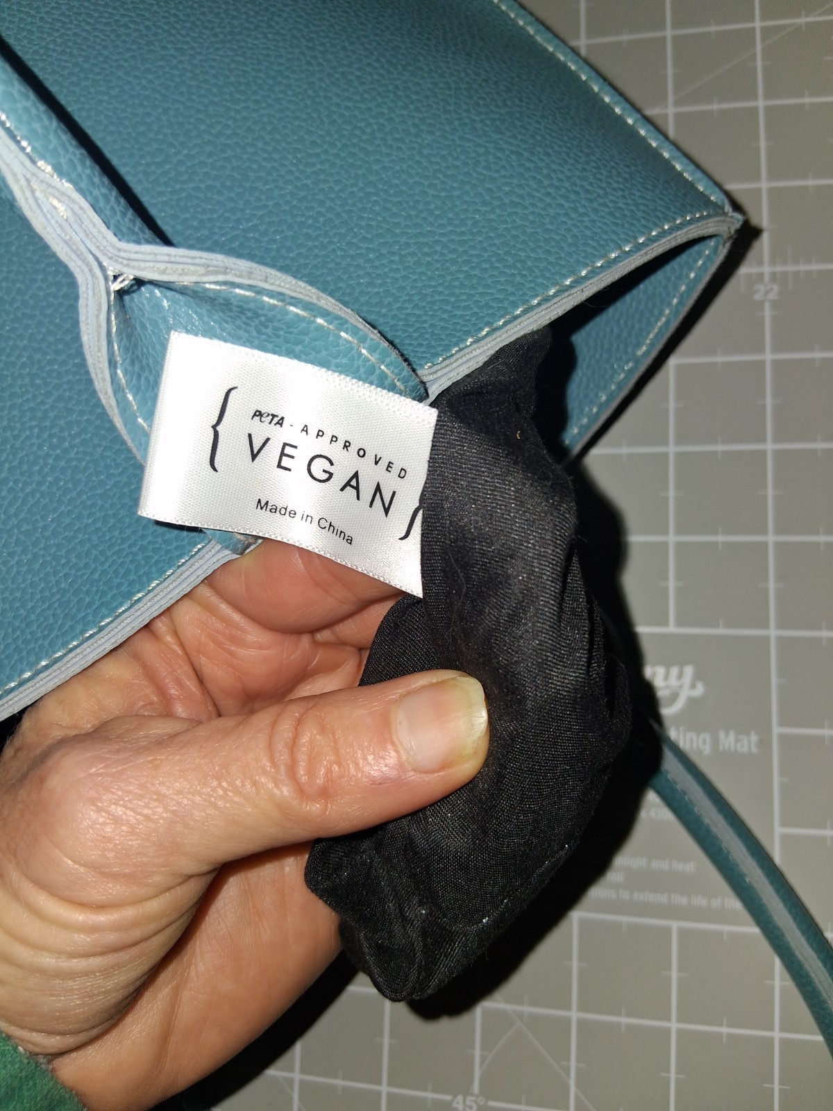 Mellow World tote grained vegan leather tulip curved front panel vibrant teal
