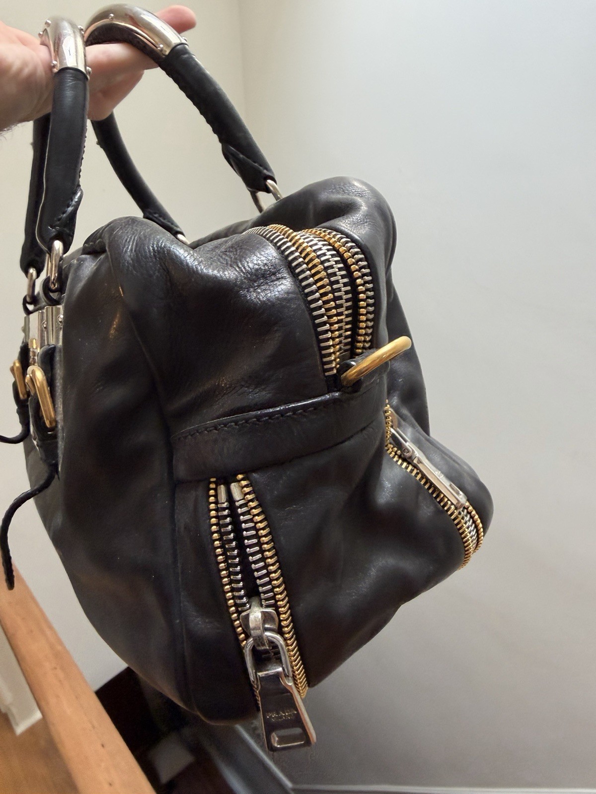 PRADA Black Top Handle Bag Gold Hardware Lock Buckle Accents Zip Closure