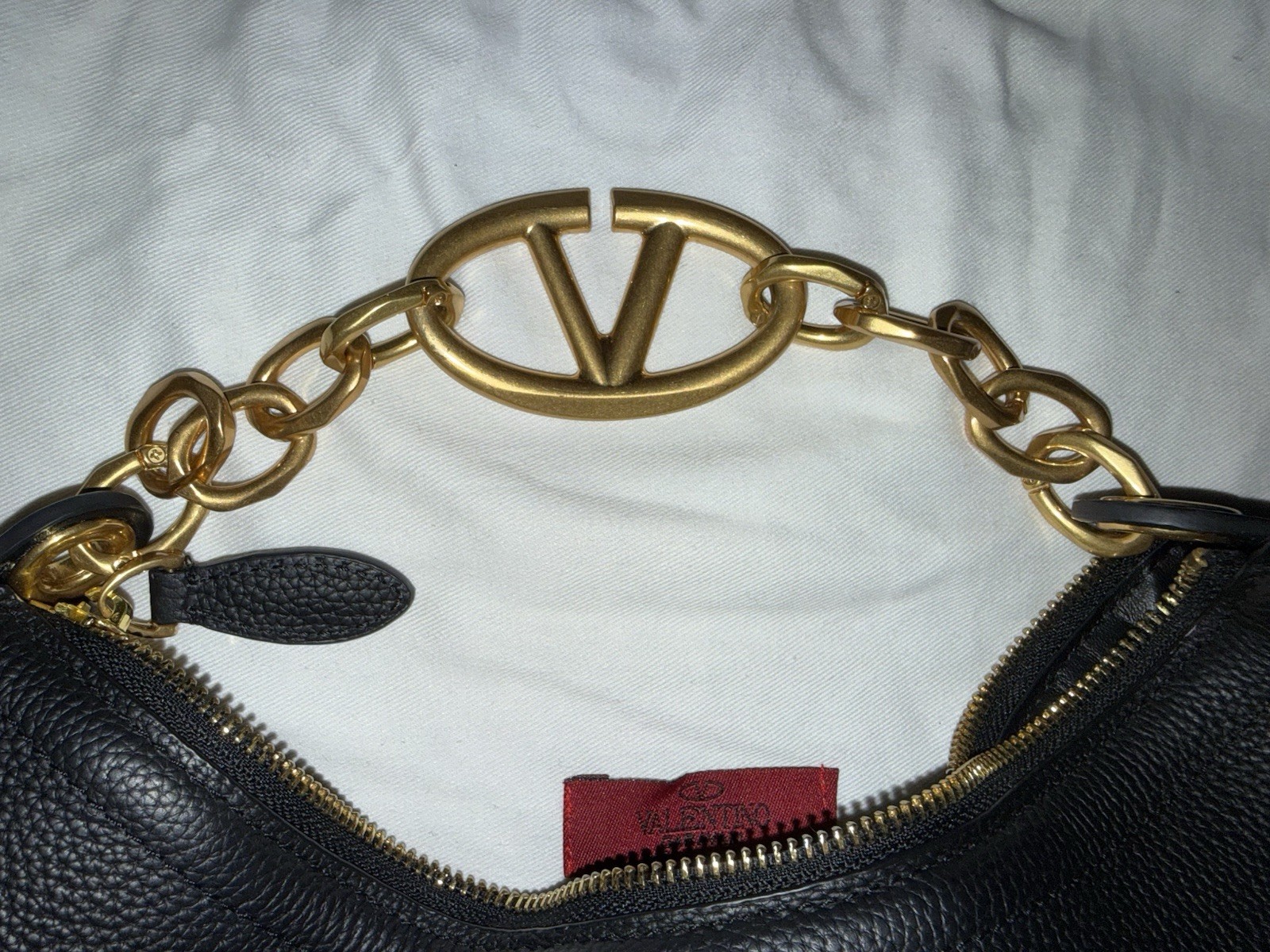 Valentino Garavani VLogo Moon small hobo bag in black grained calfskin