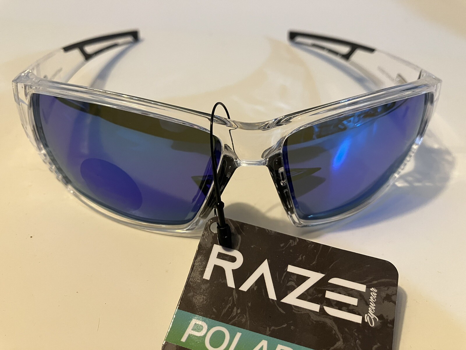RAZE Eyewear Sunglasses Sonar Polarized Clear Frame Blue Mirror Smoke 28856